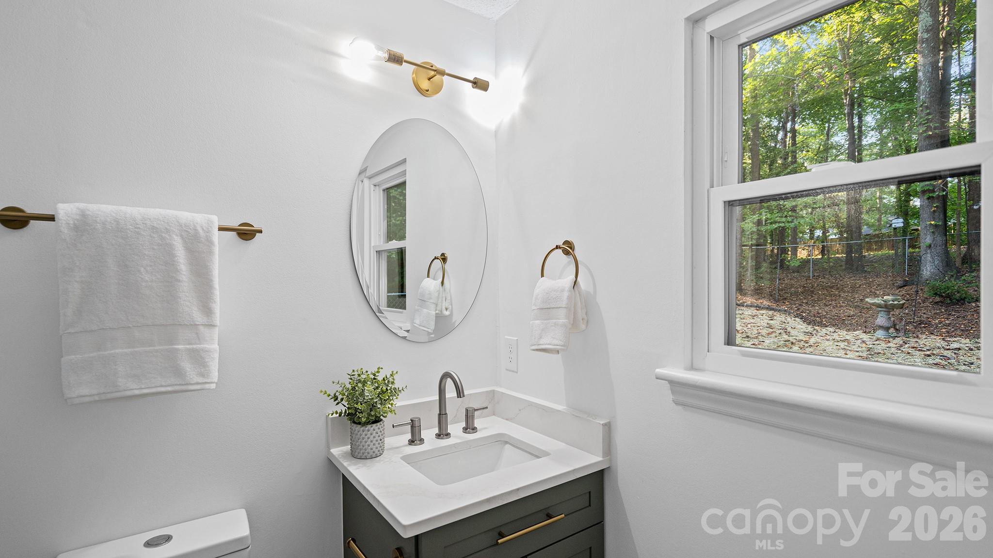 Brand New Bathroom Vanities, Sinks, Fabricated Quartz C'tops, Brushed Gold Fixtures, Dual Flush Commodes, and Mirrors - 8001 Saddlehorse Lane, Charlotte