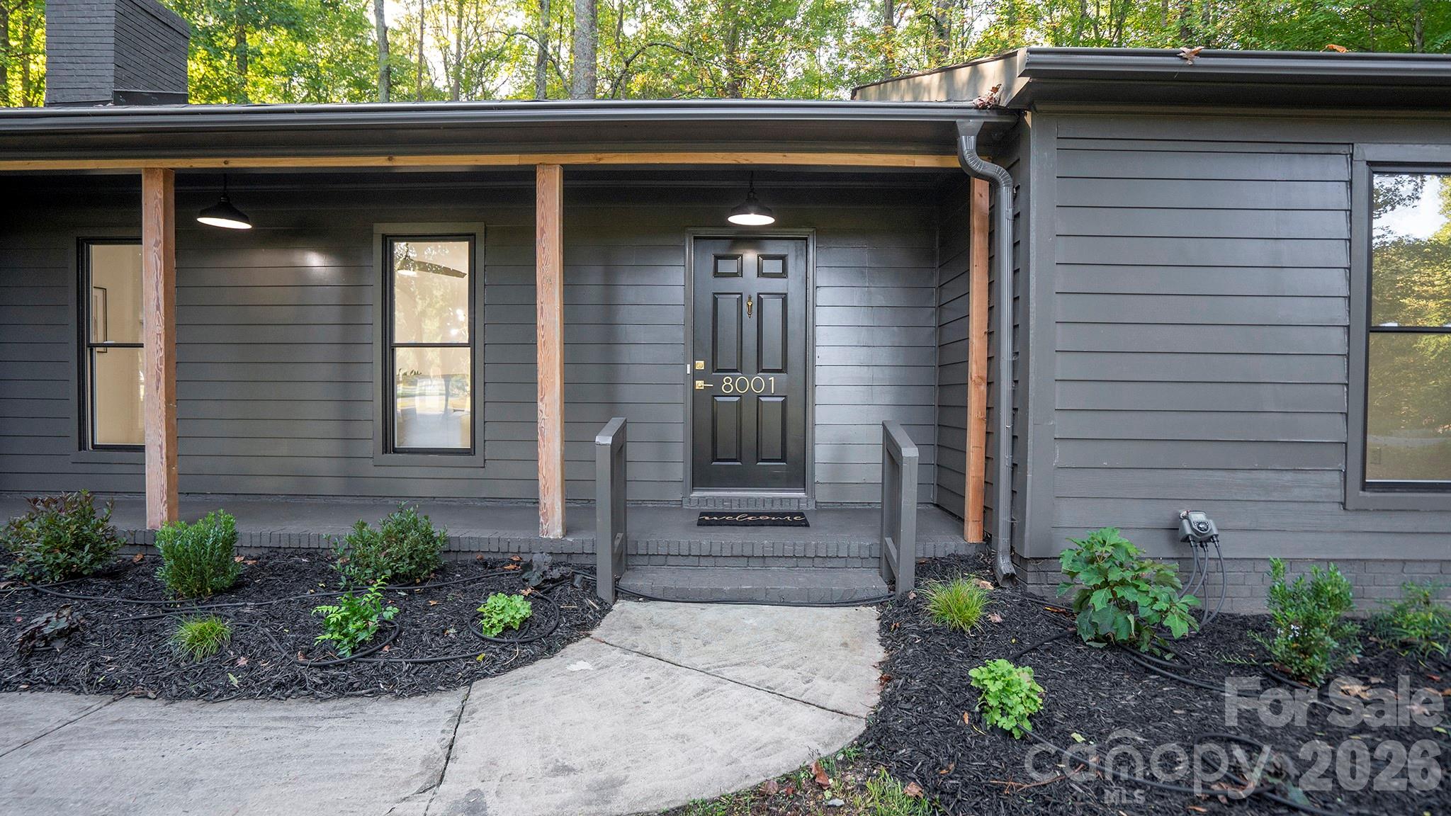Brand New Exterior Paint Job, New Exterior Lights, New Professional Landscaping, and Fresh Mulch - 8001 Saddlehorse Lane, Charlotte