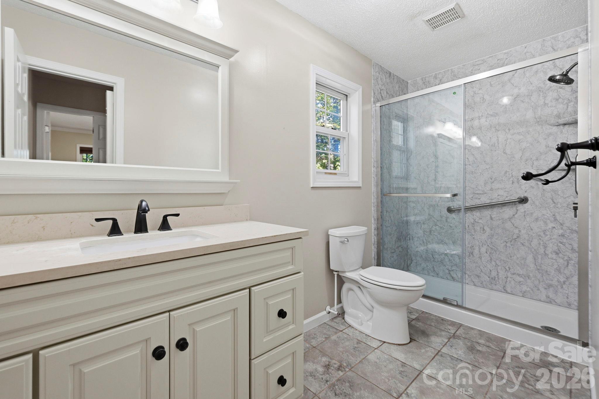 primary bath on main floor - 114 Sandpiper Palisades Street, Hendersonville