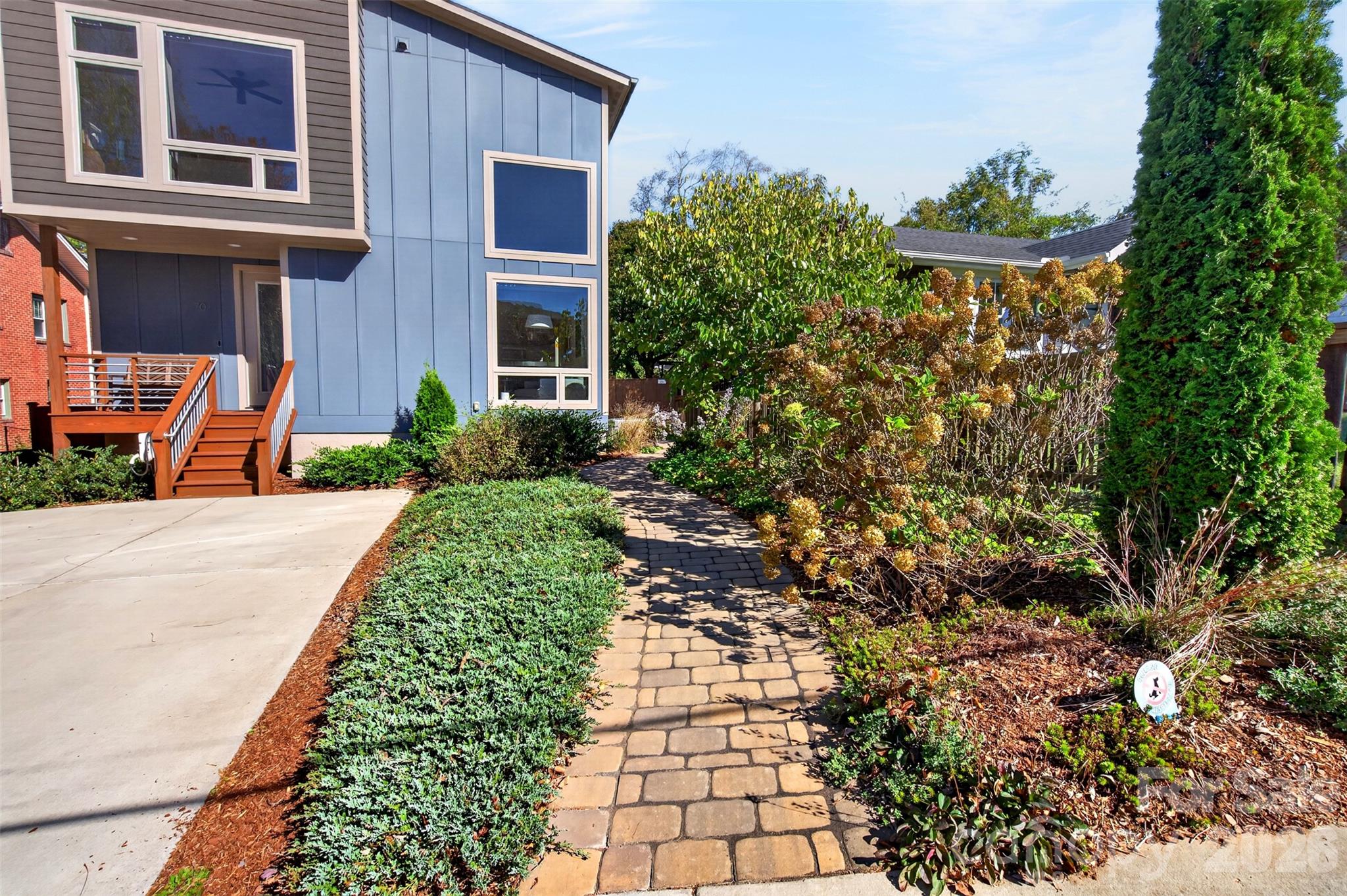 Sellers added landscaping and hardscape. - 70 Garden Circle, Asheville