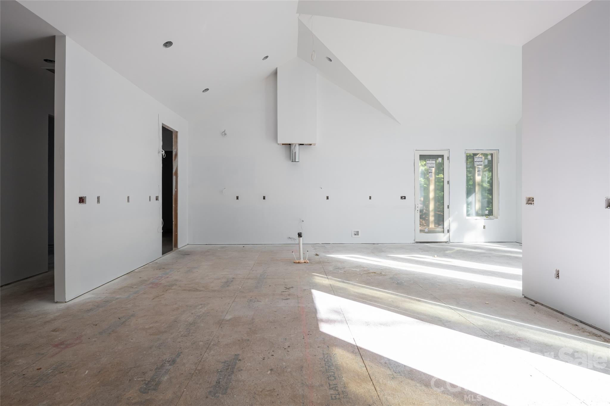 Living room looking back towards kitchen - 200 Bent Pine Trace, Hendersonville