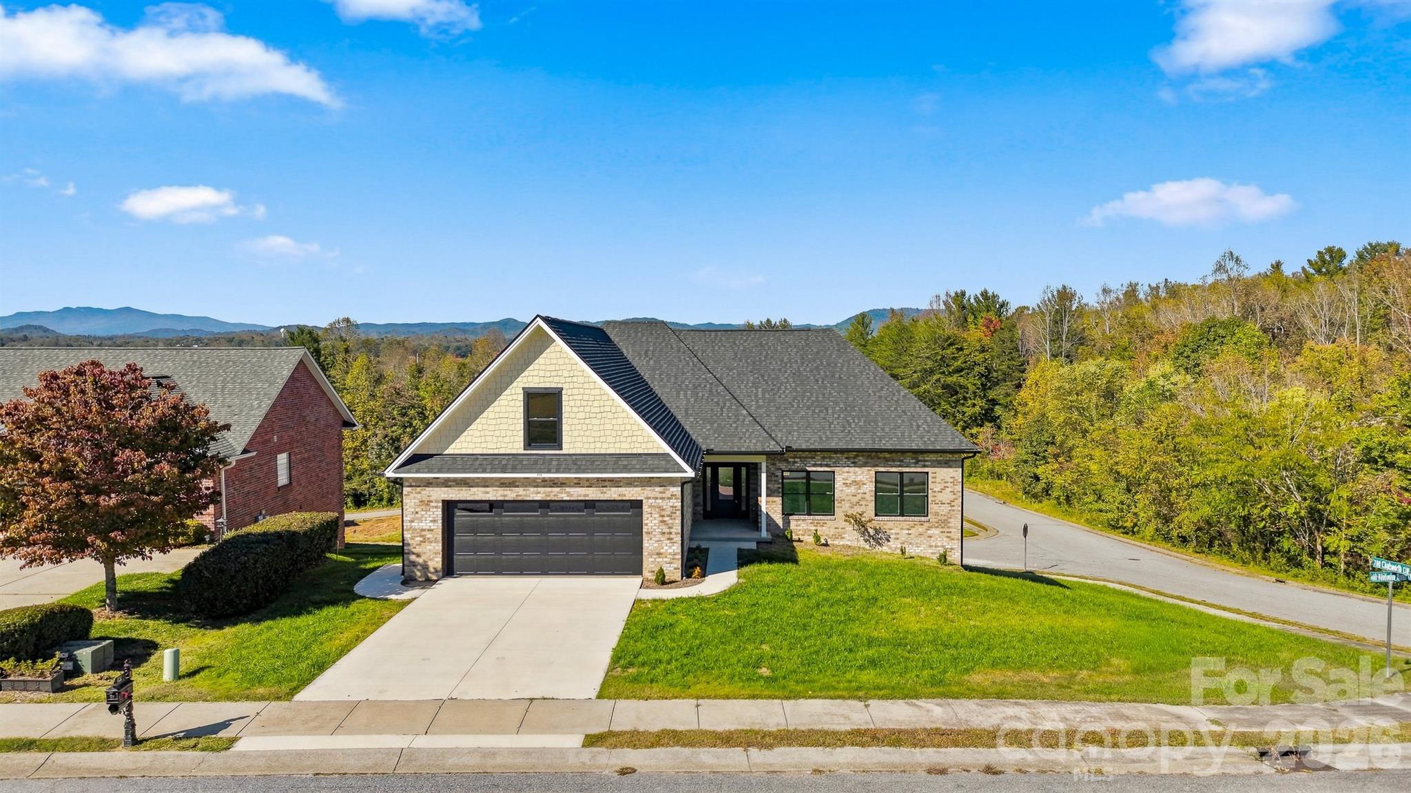 Welcome home to this stunning all brick new construction with full unfinished basemen - 426 Huntington Woods Street SE, Lenoir