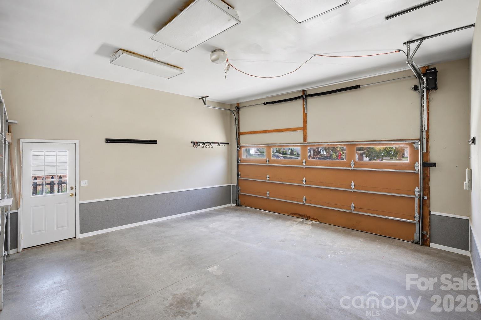 virtually staged garage - 9732 Whitewood Trail, Charlotte