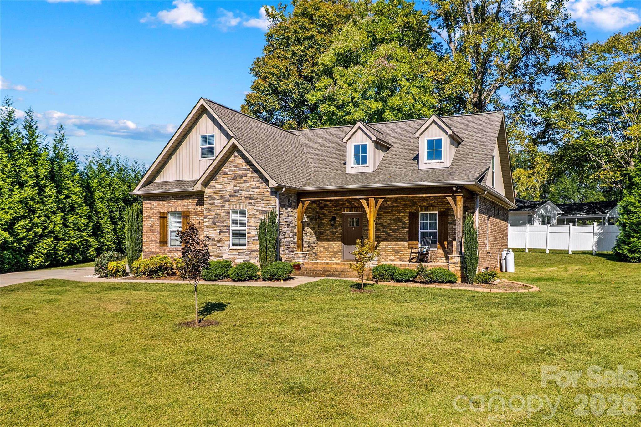 Landscaping is low-maintenance. - 178 Nellwood Court, Mocksville