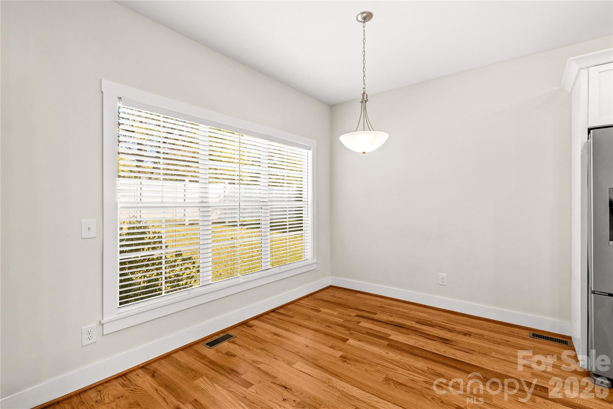 Breakfast space large enough for family dining area with natural views - 178 Nellwood Court, Mocksville