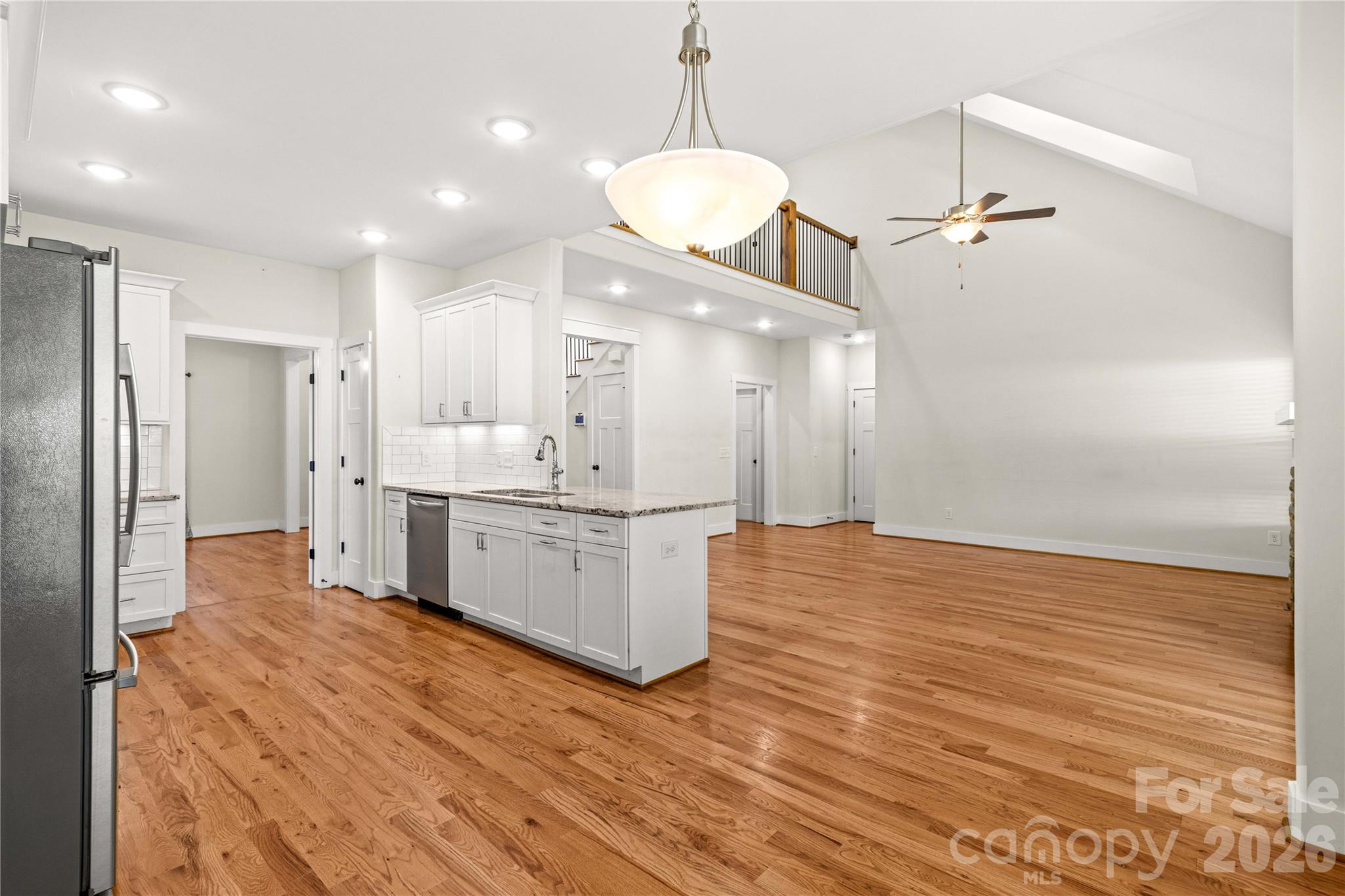 Kitchen and great room as viewed from breakfast area - 178 Nellwood Court, Mocksville