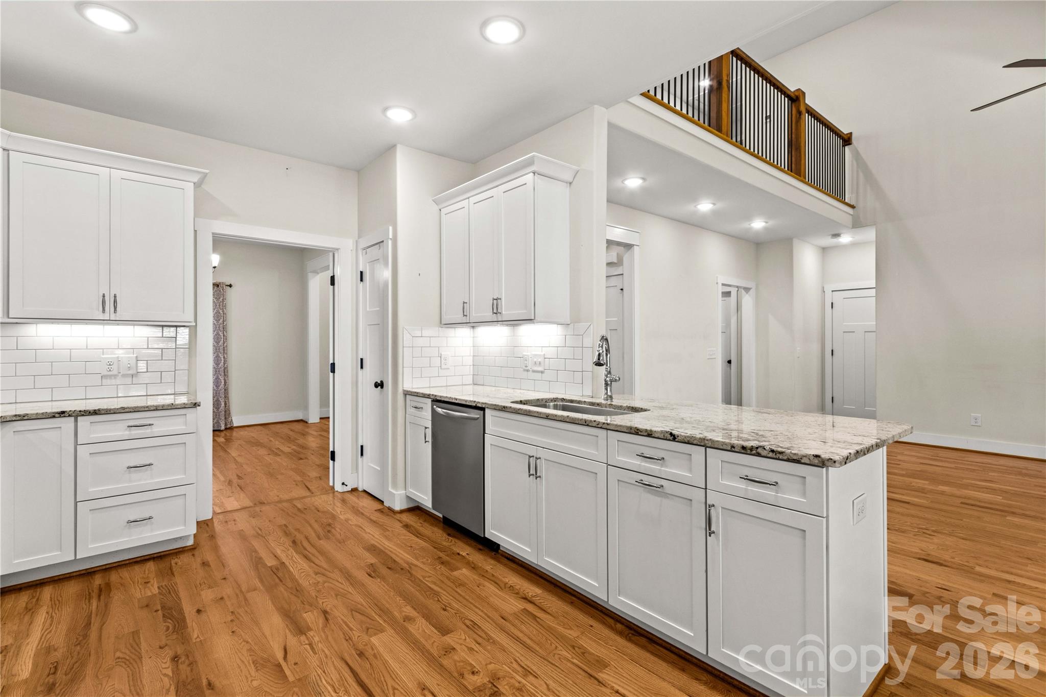 Kitchen, dining room, great room and catwalk all make this a lovely view - 178 Nellwood Court, Mocksville