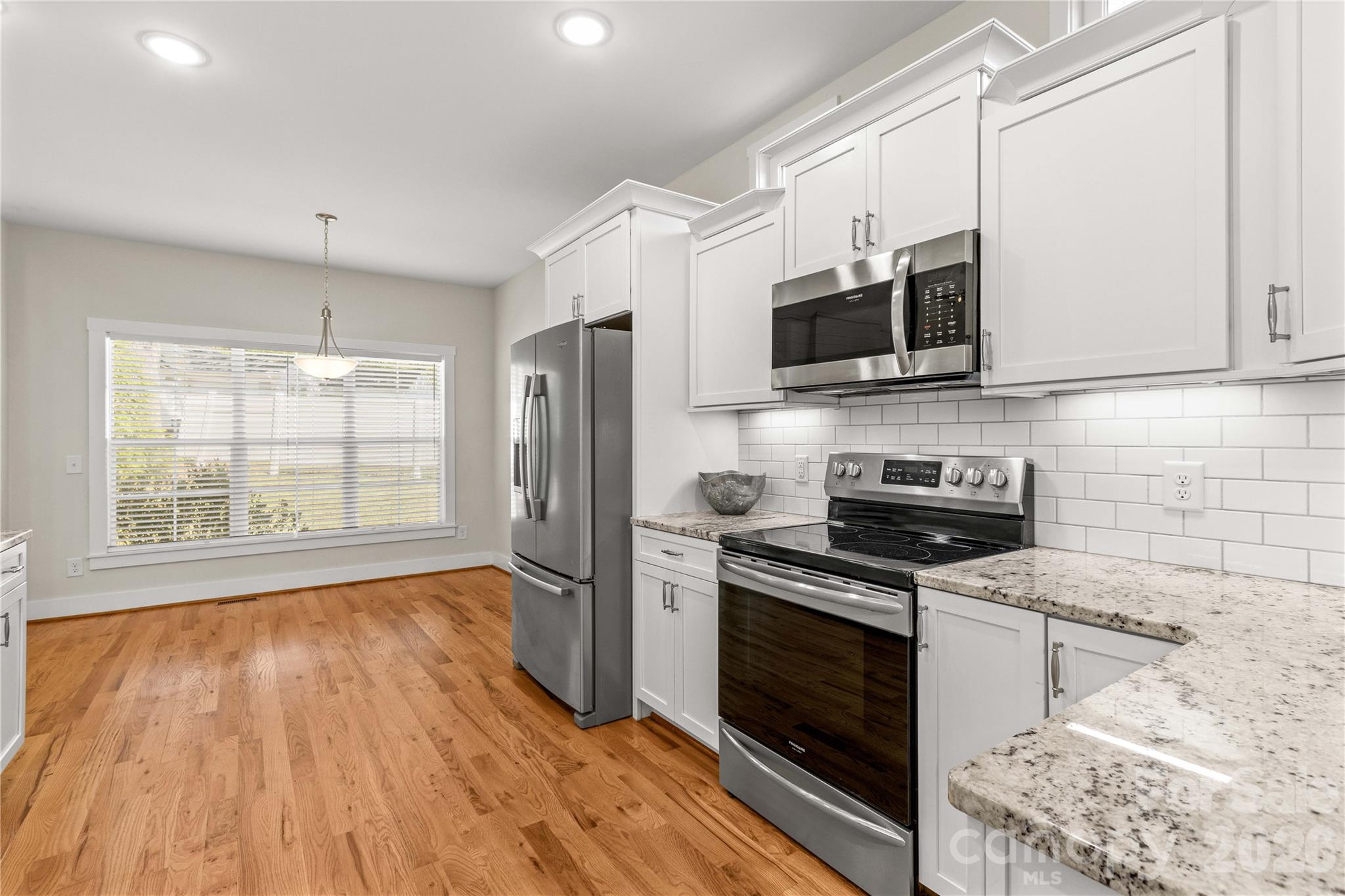 Beautiful modern kitchen with tile backsplash - 178 Nellwood Court, Mocksville