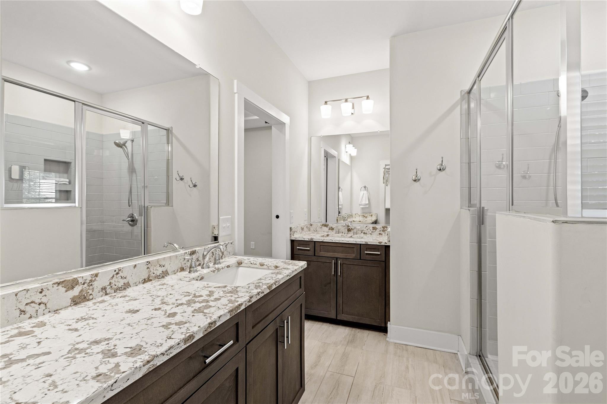 Primary bathroom with dual vanities - 178 Nellwood Court, Mocksville
