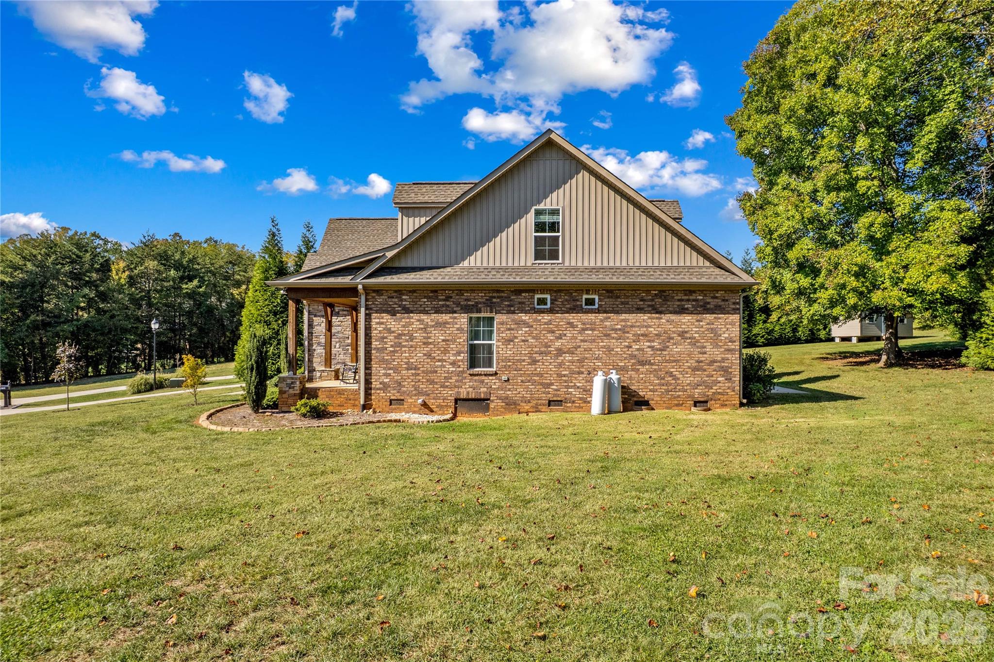 Right side view-septic located on the right side of house. - 178 Nellwood Court, Mocksville