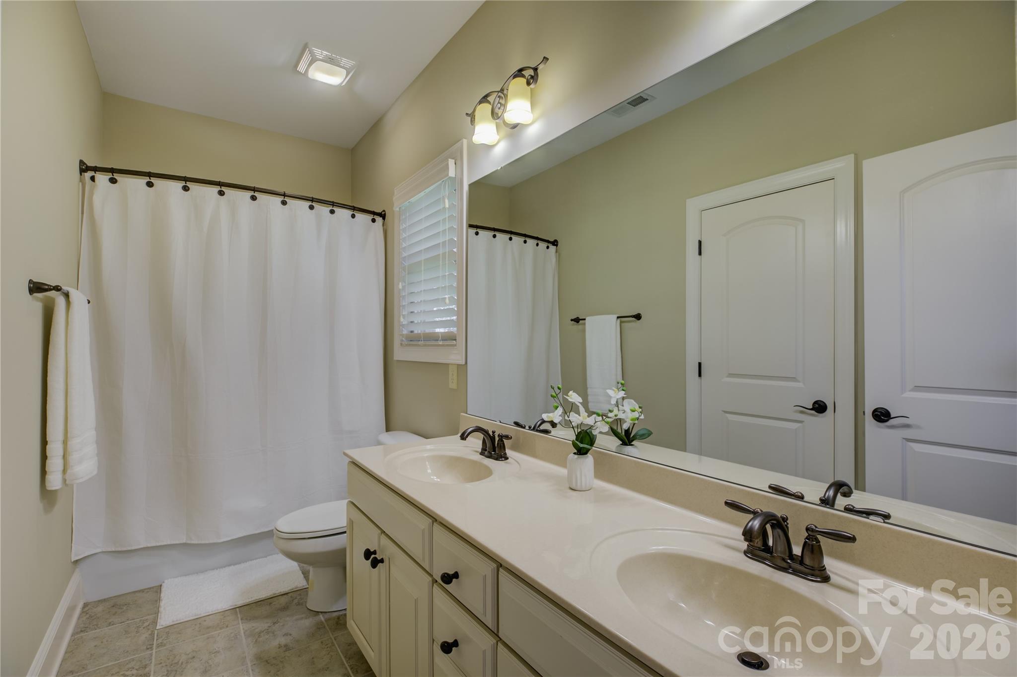 jack and Jill bathroom between bedroom 2 & 3 - 17733 Colleton River Lane, Charlotte