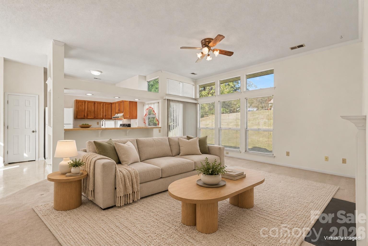 Family room virtually staged - 5929 Old Meadow Road, Charlotte