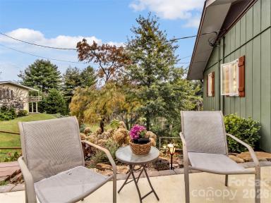 Seating outside the back door - 91 Worsham Drive, Waynesville