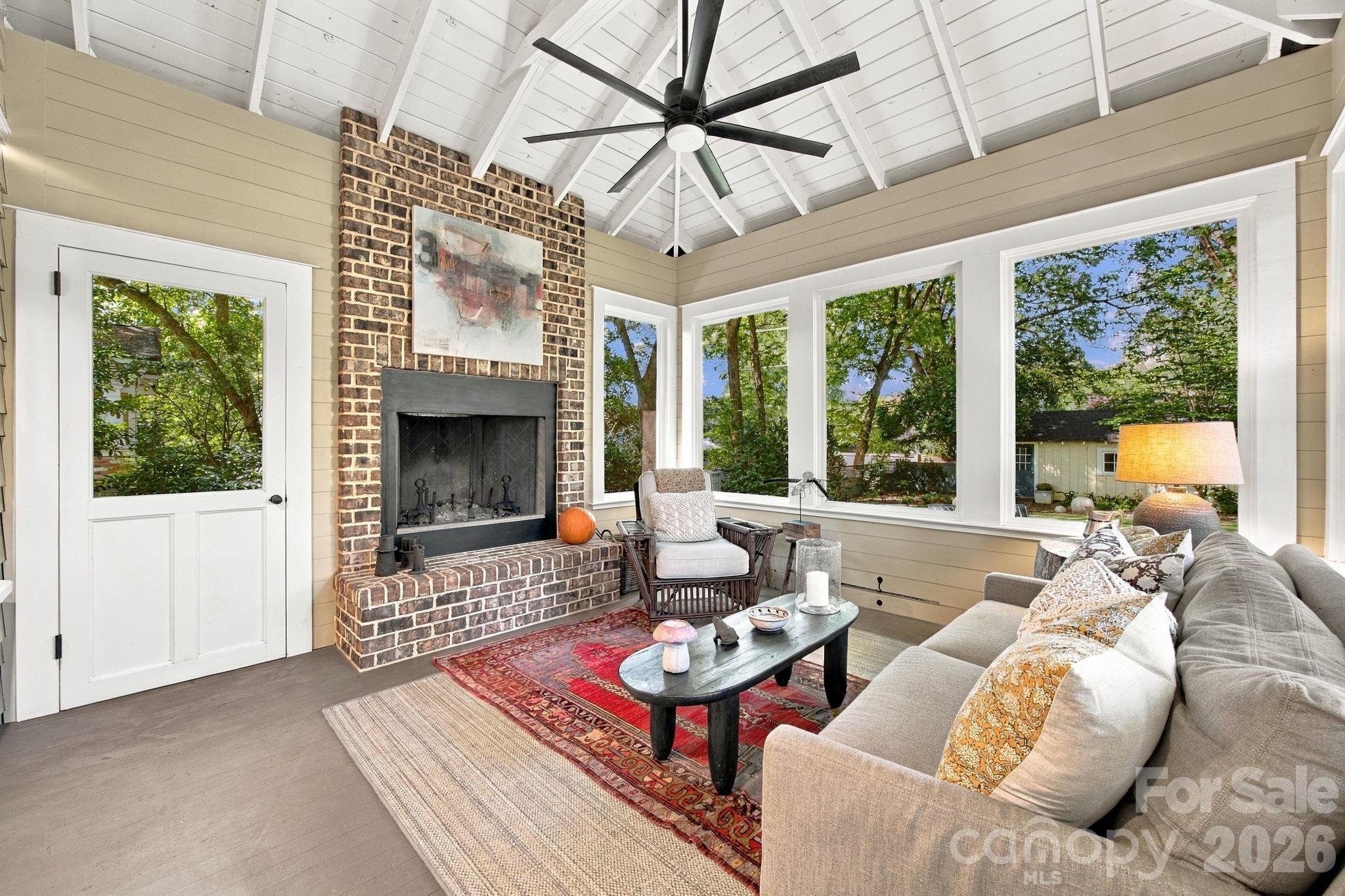 Rear screened porch with fireplace - 1912 Park Road, Charlotte