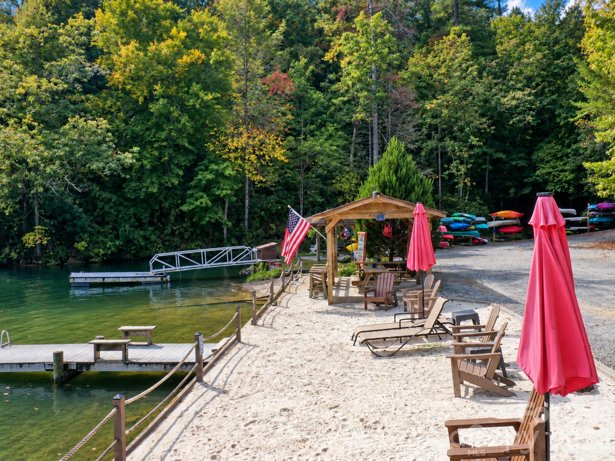 Sandy Beach Area with plenty of seating and umbrellas - 0 E Wilderness Road, Lake Lure