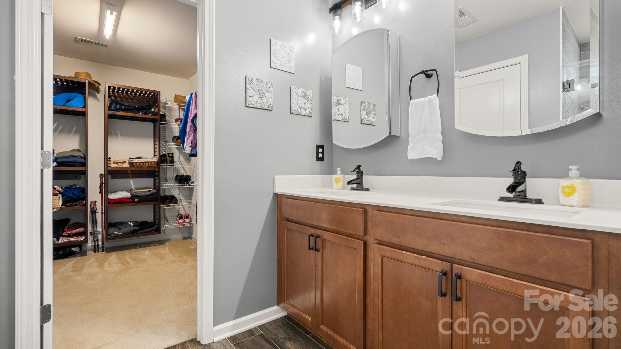 Primary ensuite with double sinks, water closet, deep linen closet - 1232 New River Drive, Concord