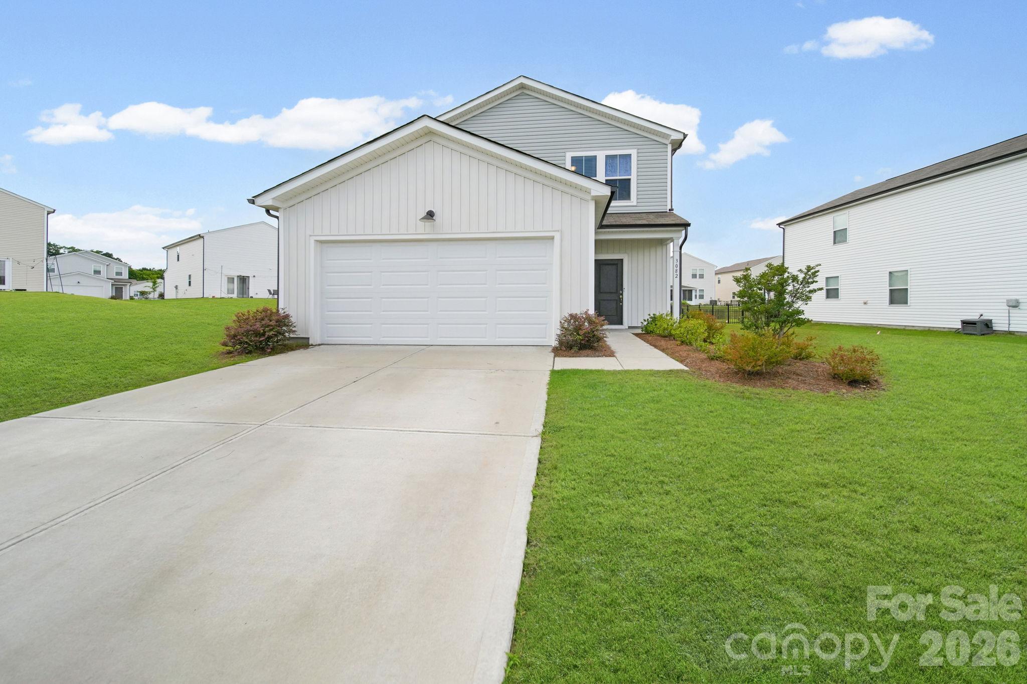 A bird's eye view, giving attention to the large lot that the property sits on. - 3082 Bell Spur Avenue SW, Concord
