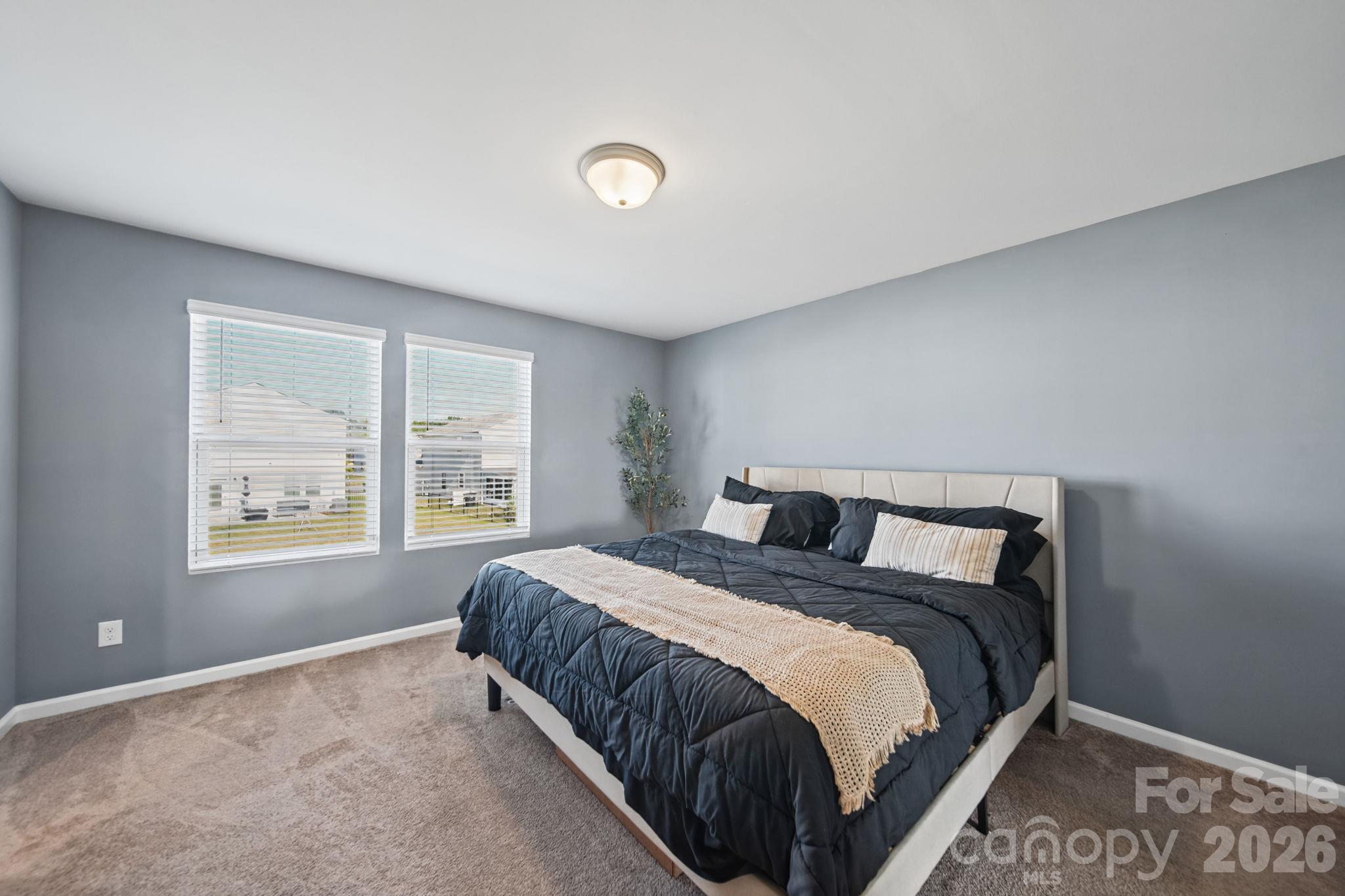 Spacious Primary Bedroom. A place to rest, a place to enjoy. - 3082 Bell Spur Avenue SW, Concord