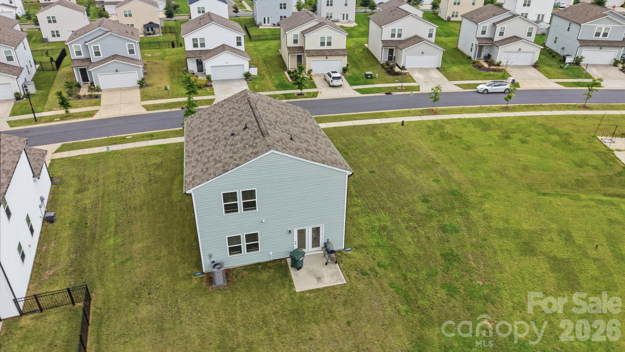Bird's eye view of the back exterior of the Home. - 3082 Bell Spur Avenue SW, Concord