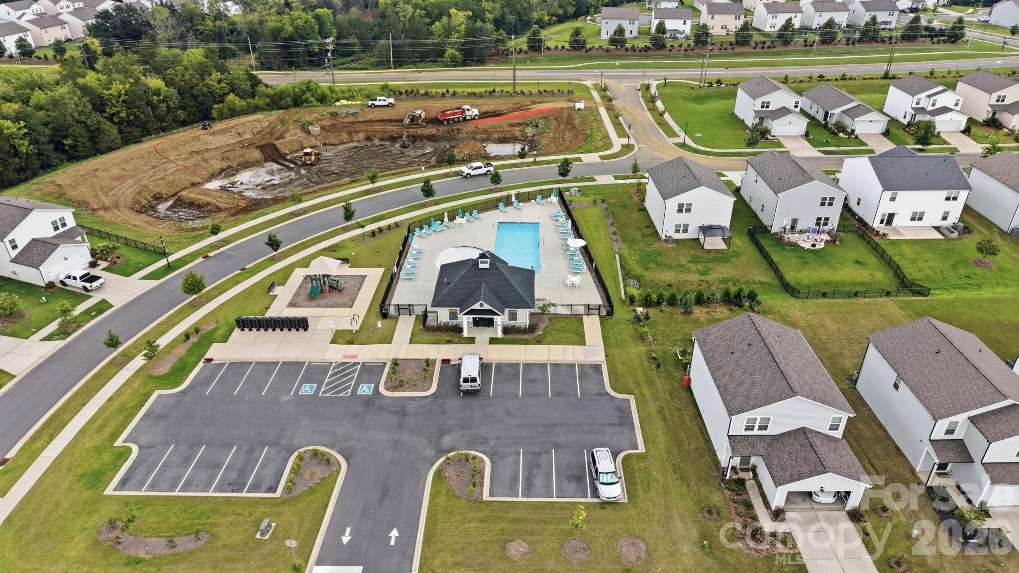 A bird's eye view of the Neighborhood focal points - Pool, Cabana and Playground. More than ample parking. - 3082 Bell Spur Avenue SW, Concord