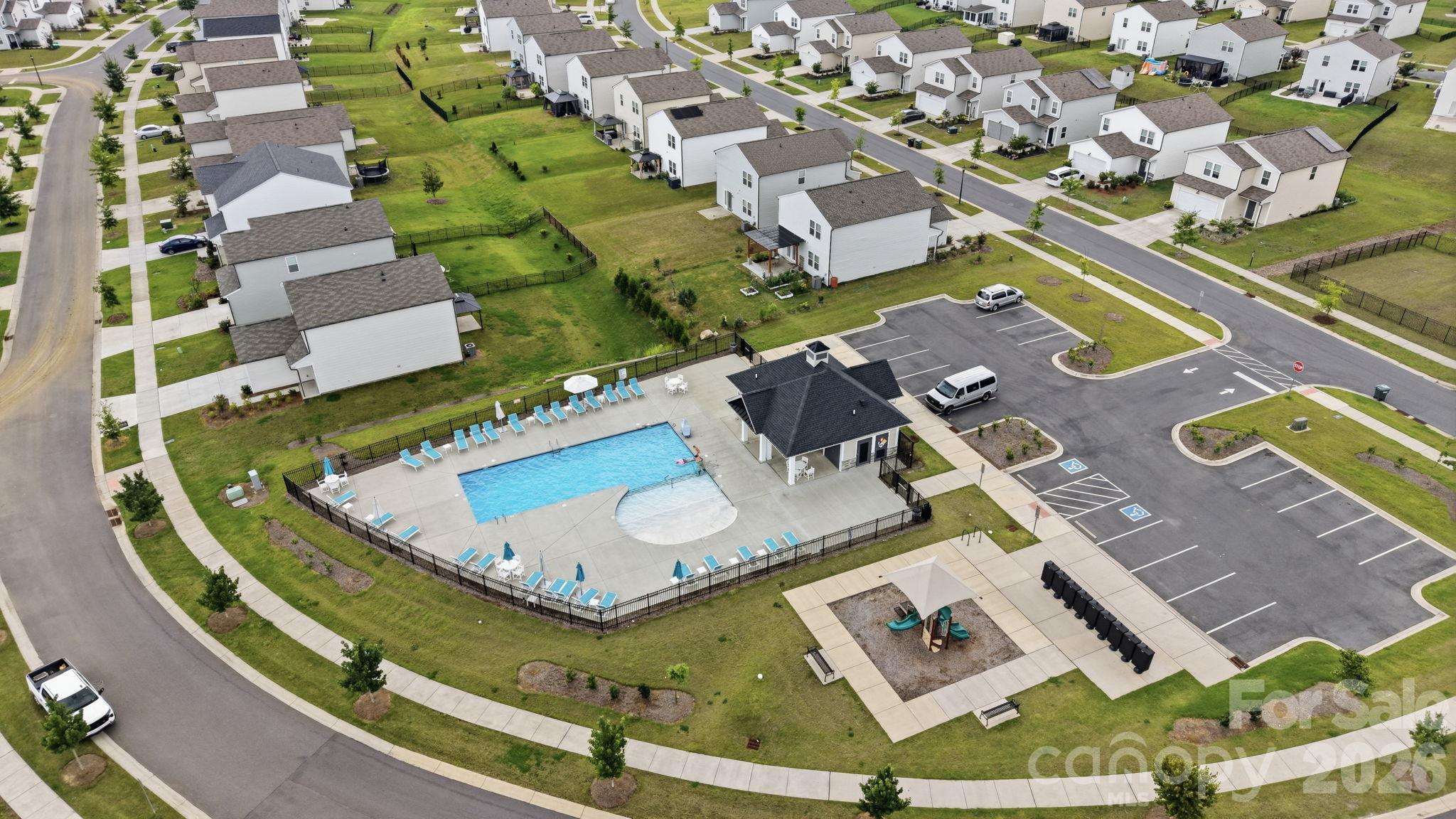 A bird's eye view of the Neighborhood focal points - Pool, Cabana and Playground. More than ample parking. - 3082 Bell Spur Avenue SW, Concord