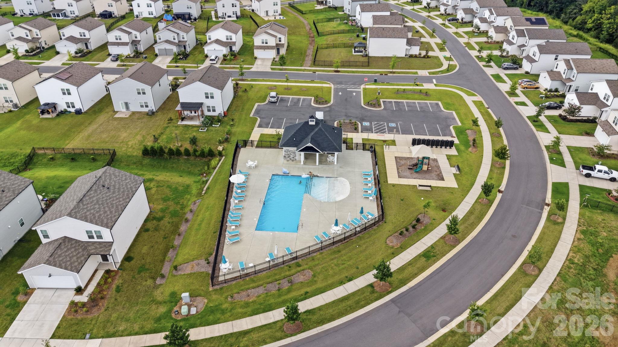 A bird's eye view of the Neighborhood focal points - Pool, Cabana and Playground. More than ample parking. - 3082 Bell Spur Avenue SW, Concord