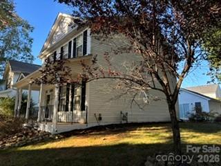 View From the Corner,Side Landscaping, Painted Foundation - 15404 Crossing Gate Drive, Cornelius
