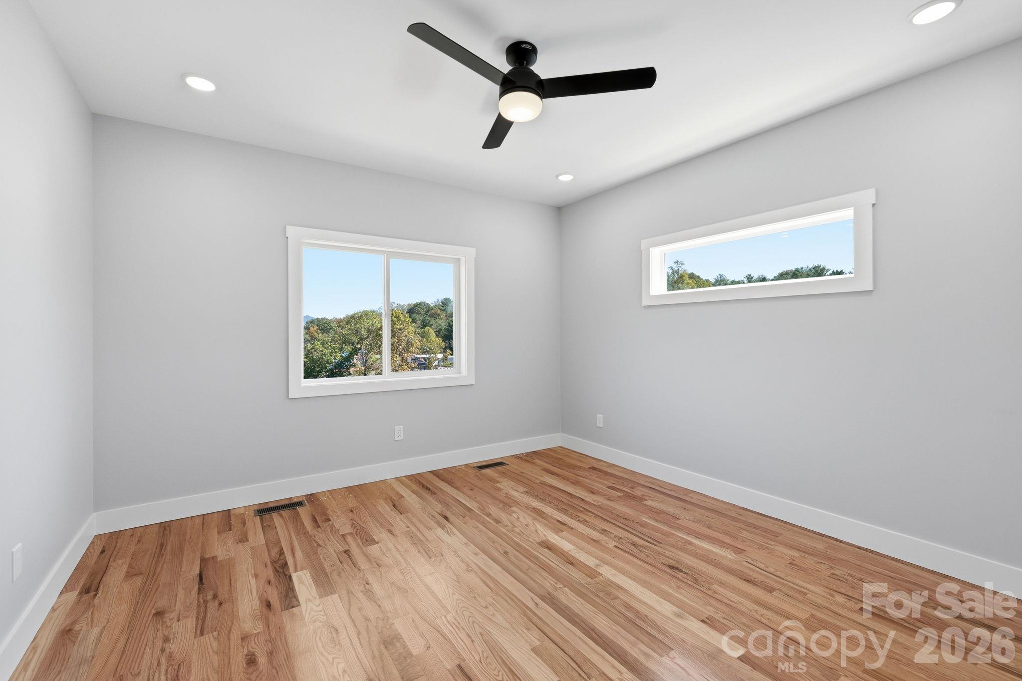 primary bedroom on the upper level - 20 Laurel Loop, Asheville