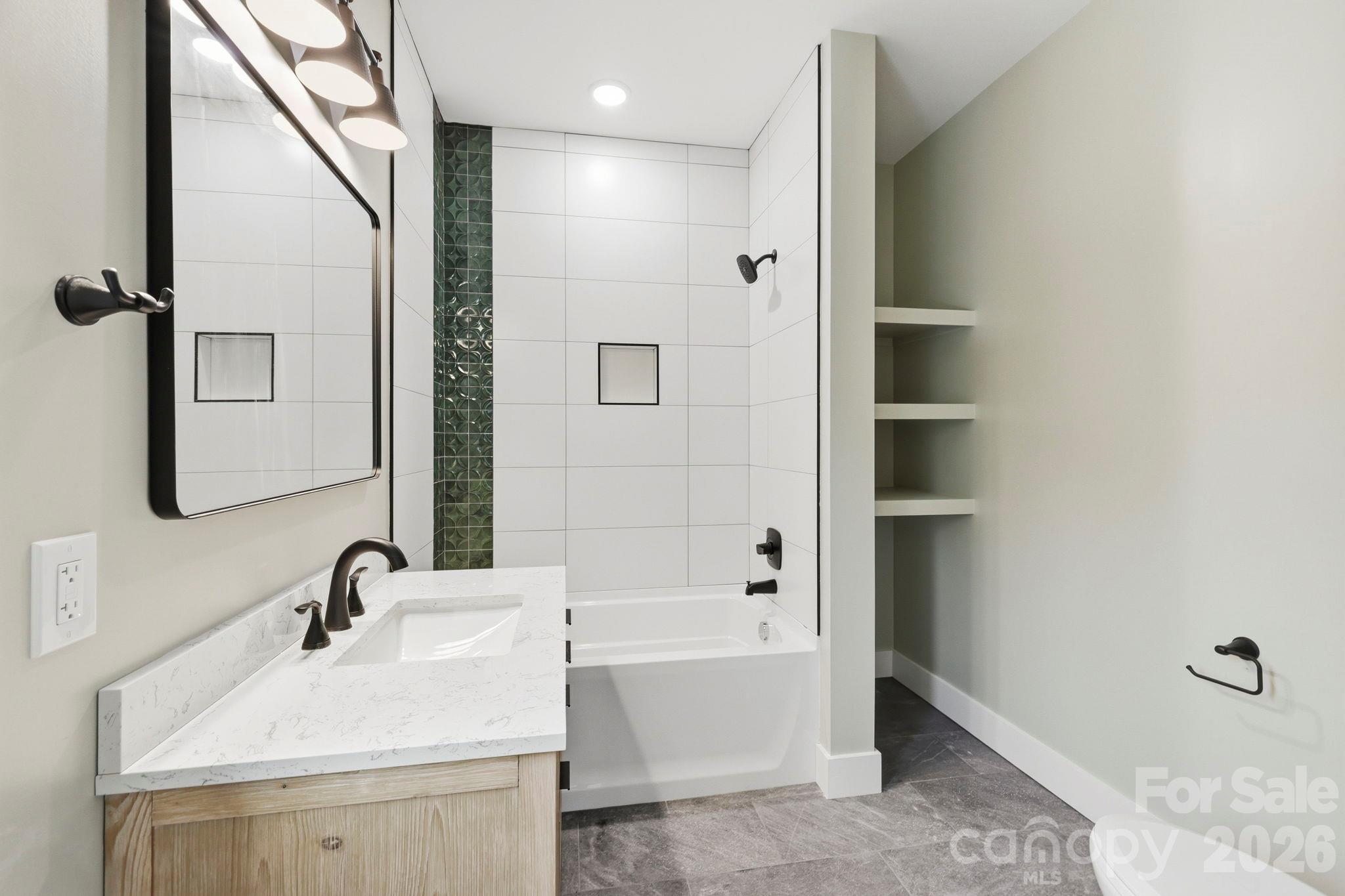 Full bathroom on the upper level with stylish accents - 20 Laurel Loop, Asheville