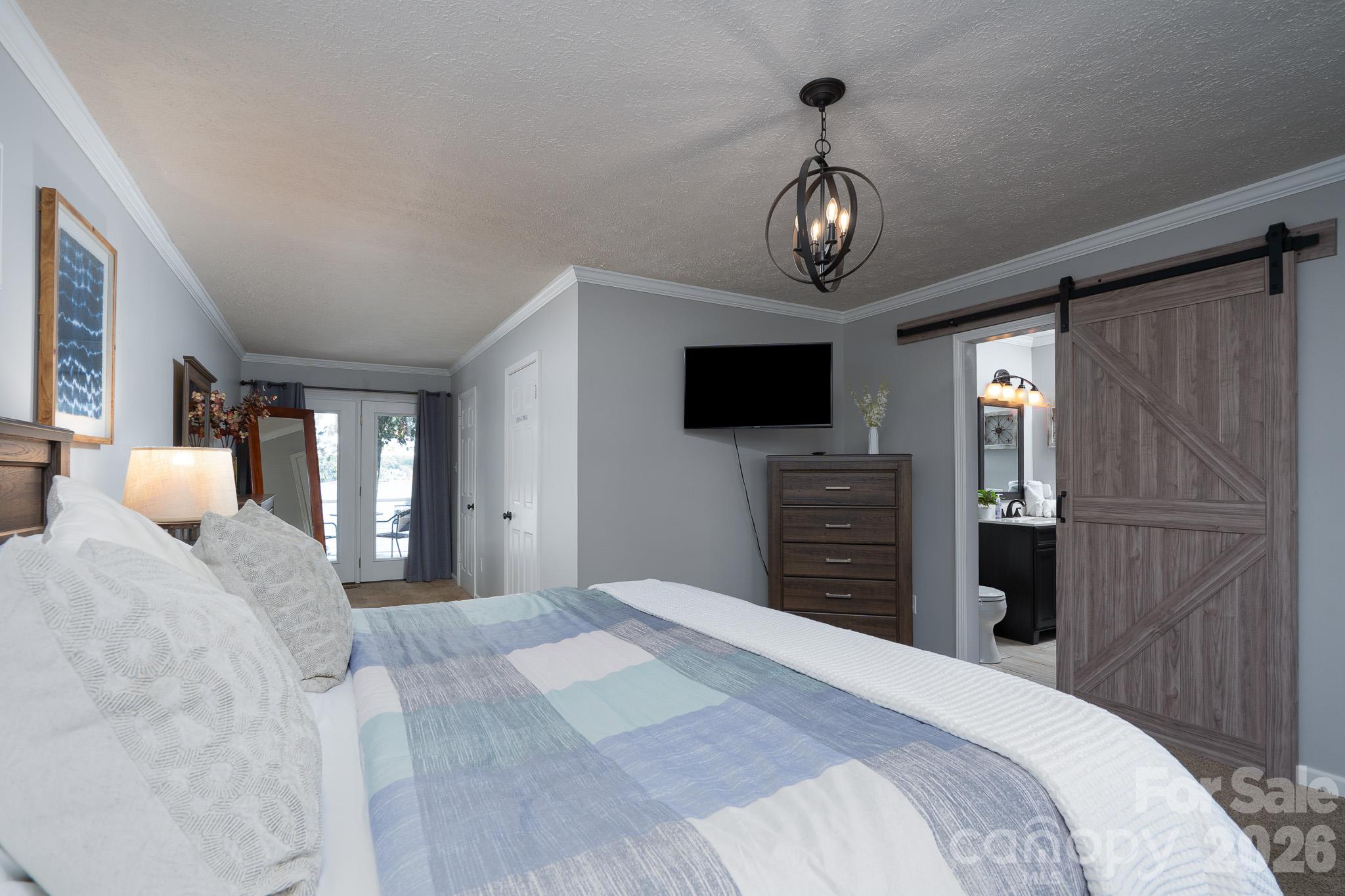 Primary Bedroom with balcony - 9598 Riviera Drive, Sherrills Ford