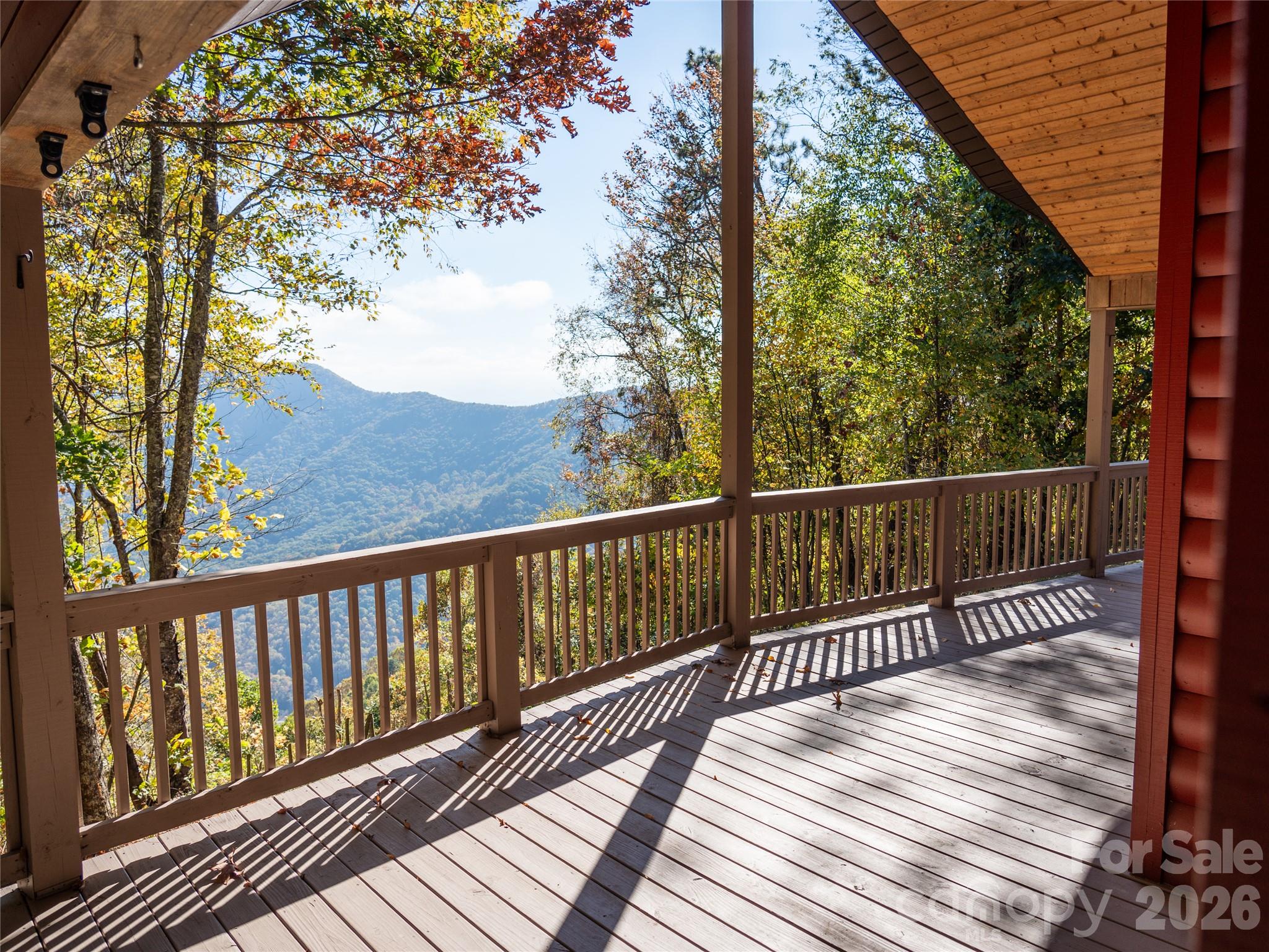 Covered porch with long range view of the Newfound Range and beyond - 51 Stony Pond Lane, Canton