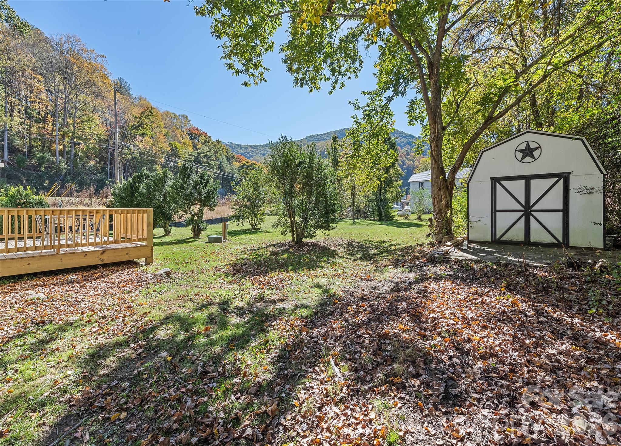 Backyard with Storage Shed - 179 Jonathan Creek Road, Waynesville