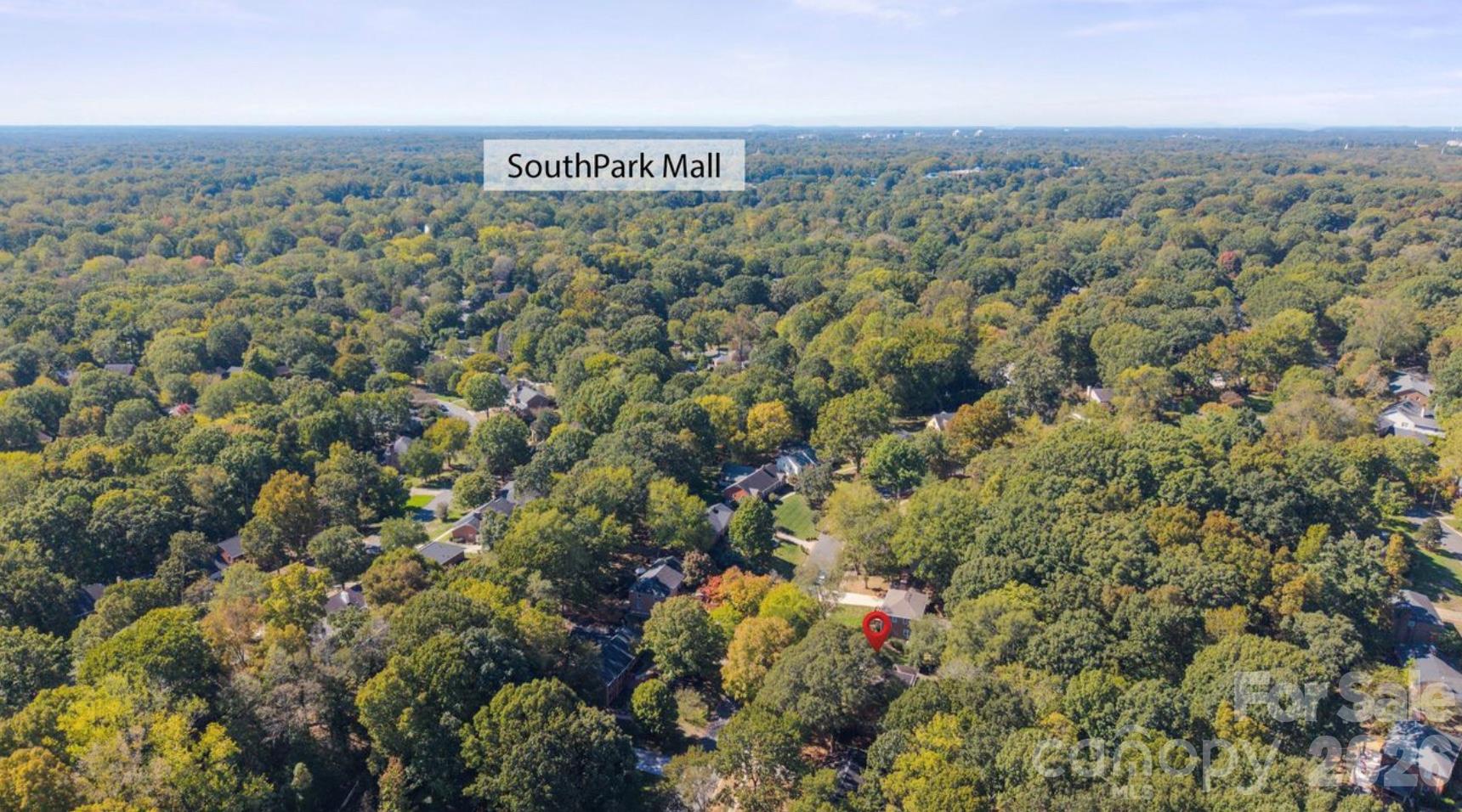 The red pin is dropped over the house showing the proximity to South Park Mall area just under 5 miles away. - 6626 Rocky Falls Road, Charlotte
