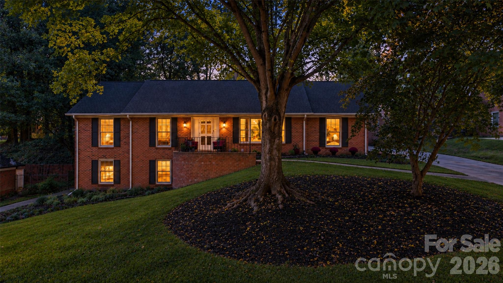 Check out this beauty at twilight - 6626 Rocky Falls Road, Charlotte