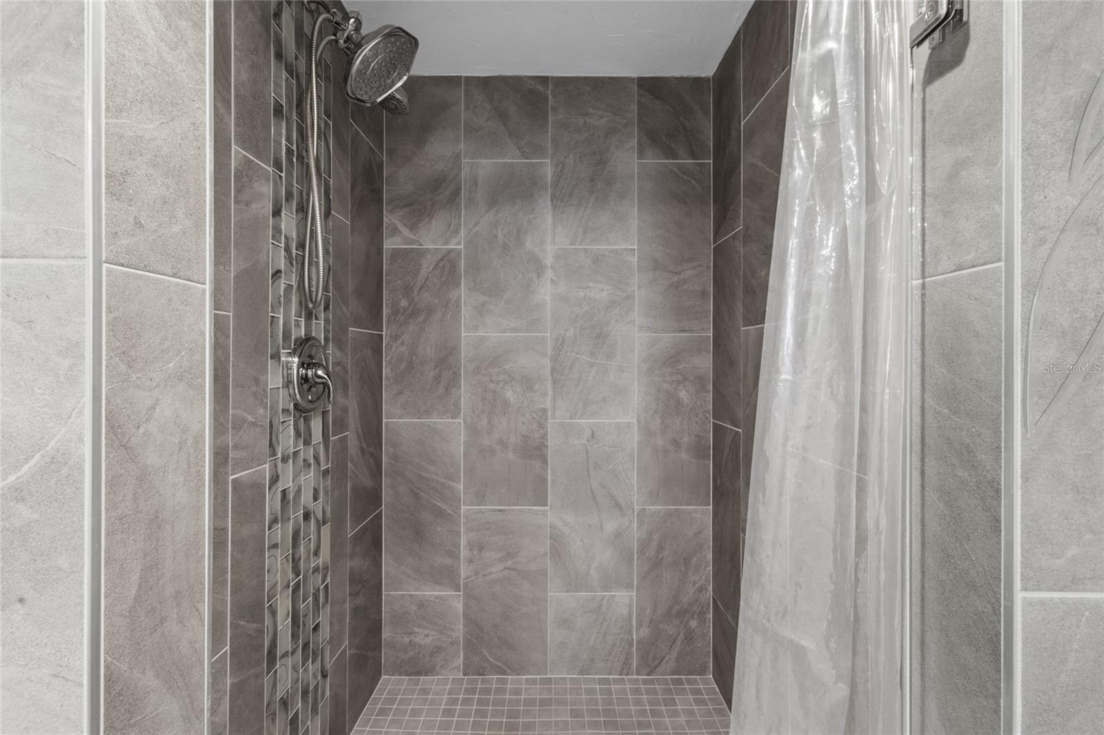 remodeled shower in Primary - 17920 GULF BLVD #302, REDINGTON SHORES