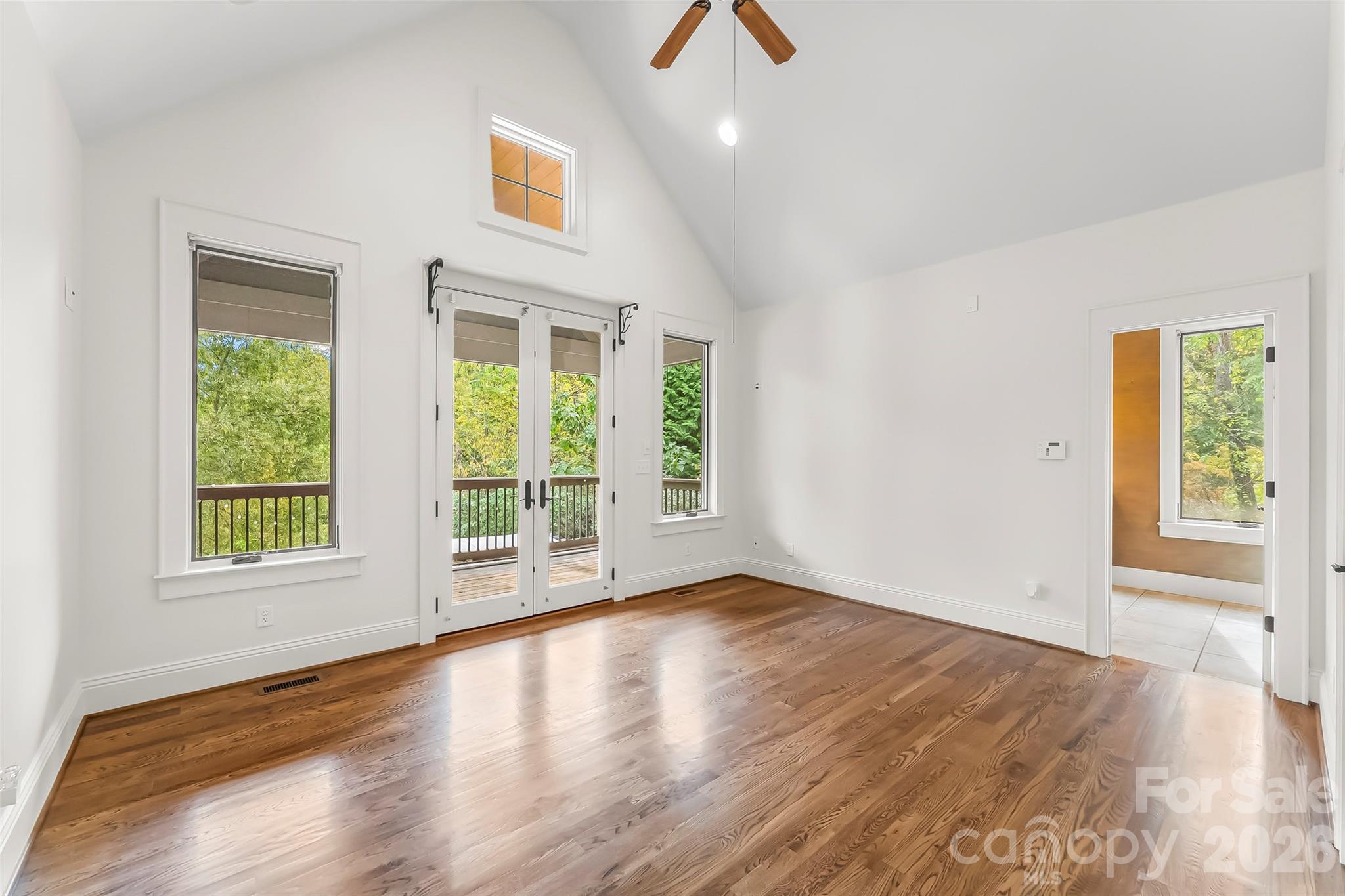 72-B Oteen Church Rd (Main House): Primary bedroom suite with walk-in closet and access to deck overlooking pool - 68, 72, 82, and 84 Oteen Church Road, Asheville