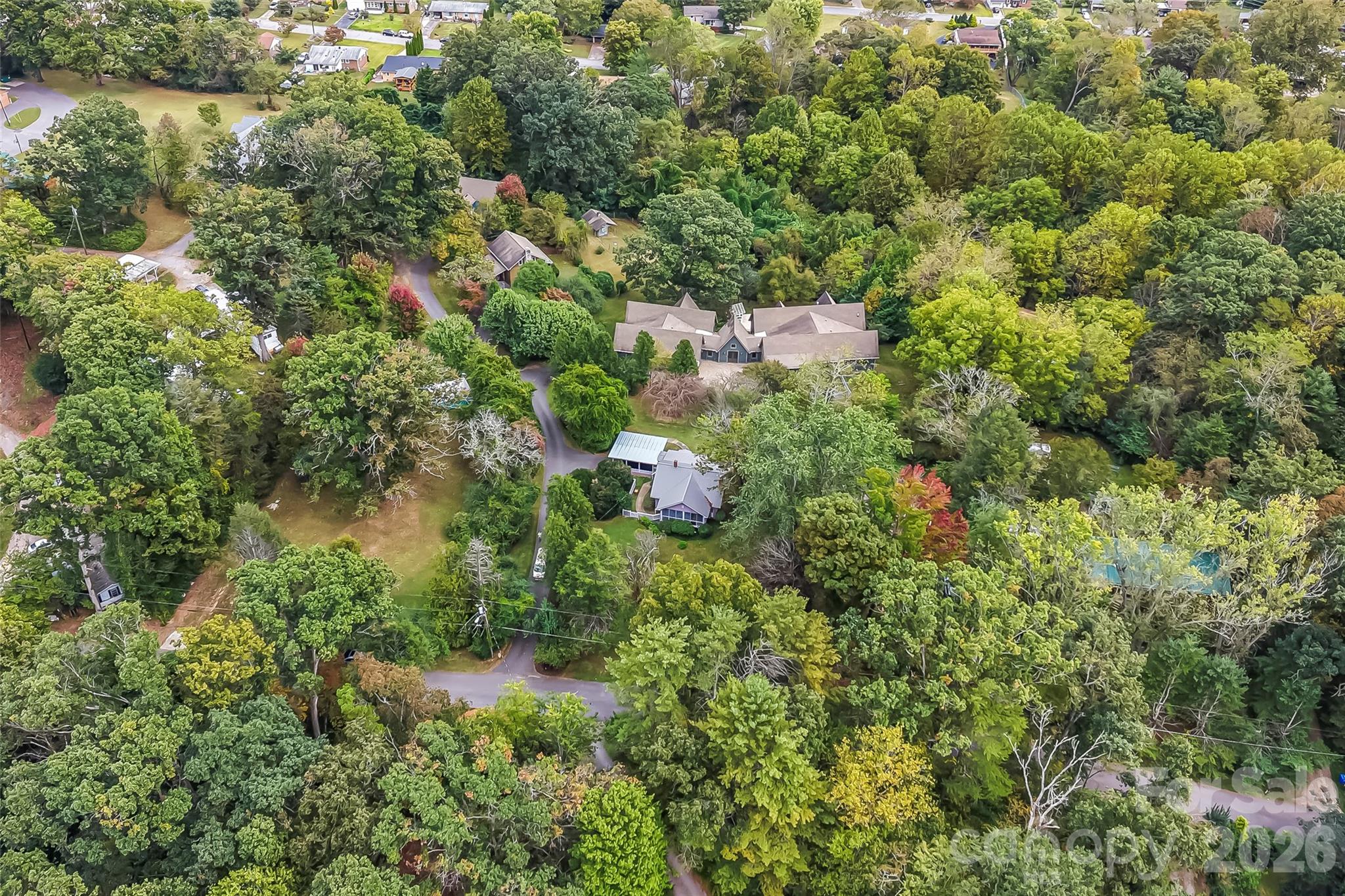 Aerial view of 3 parcels with 4 houses - 68, 72, 82, and 84 Oteen Church Road, Asheville
