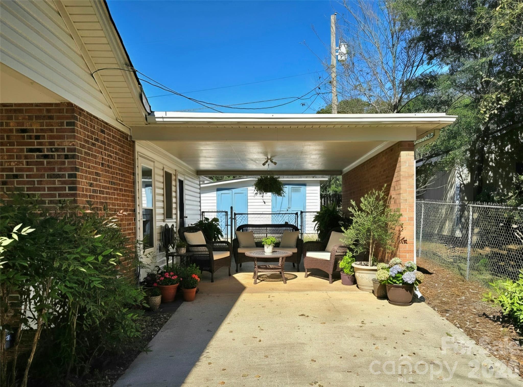 Virtual representation of carport #2 being used as a covered patio area. - 112 Wendover Drive, Lincolnton