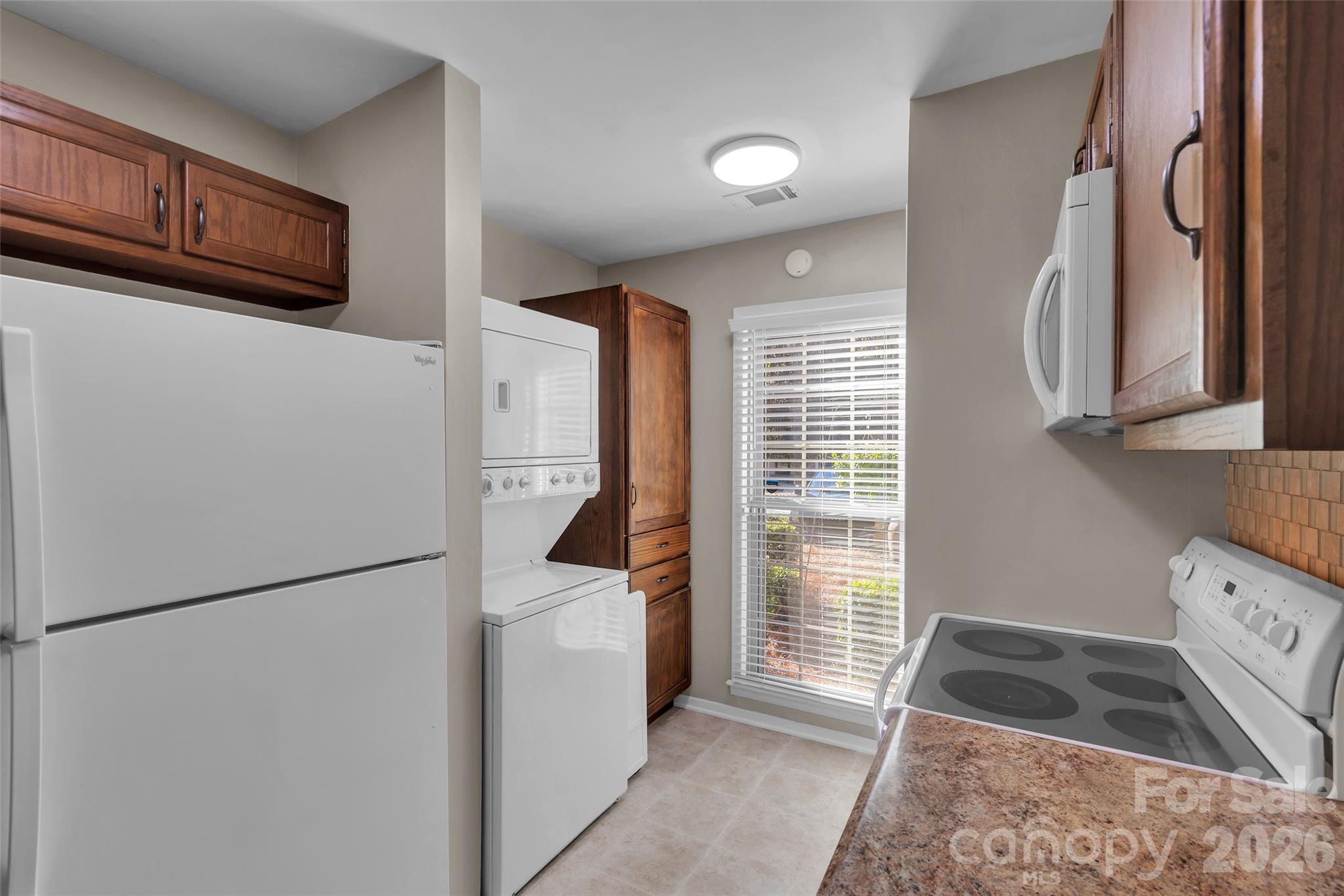 Kitchen, Laundry and 1 of 2 pantries - 9004-C Nolley Court, Charlotte