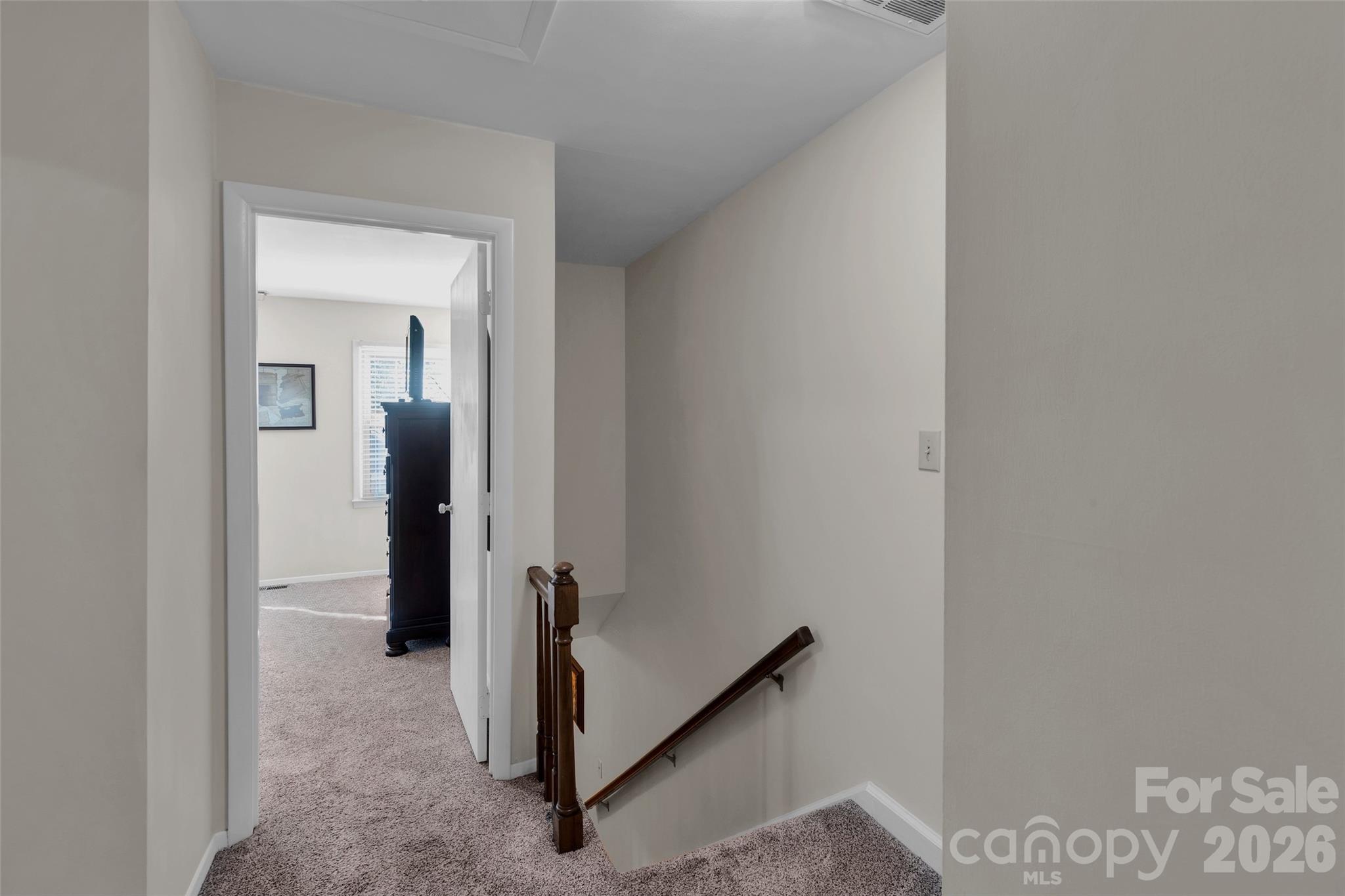 Up Stairs Landing with Pull Down Attic Stairs with Storage - 9004-C Nolley Court, Charlotte