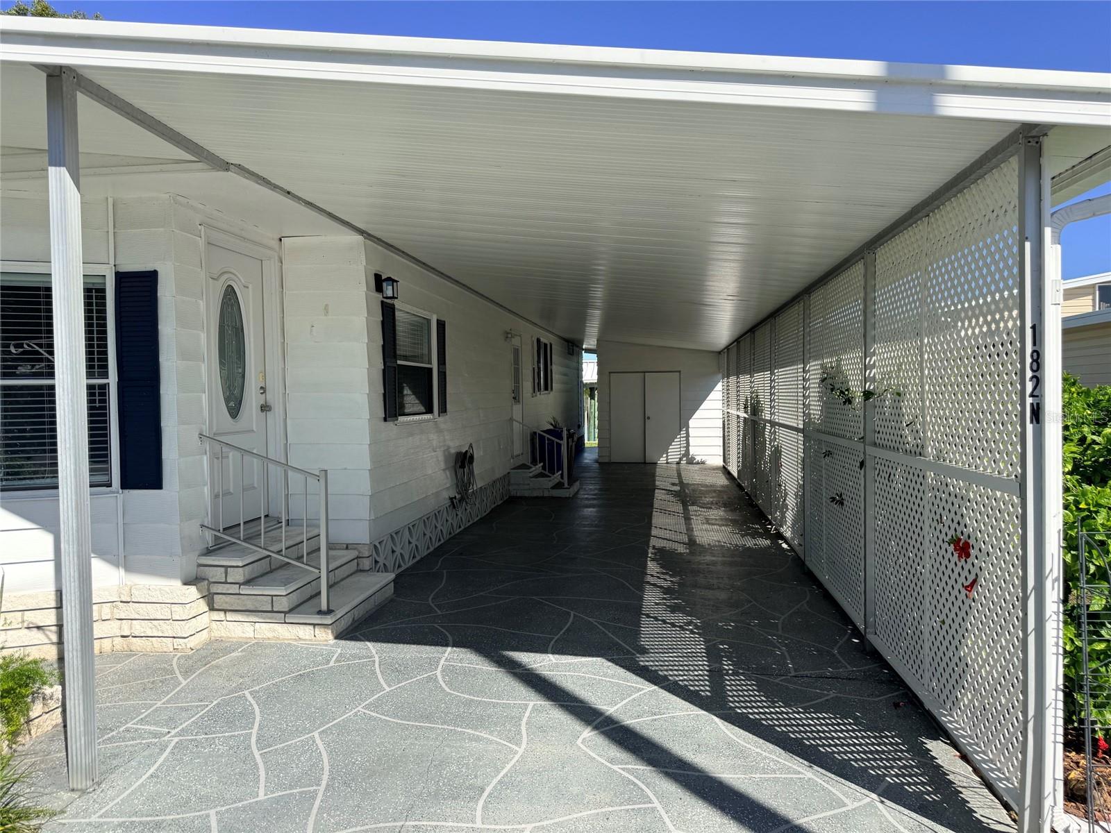Exterior Right Carport & Entry - 182 N SAINT THOMAS CIR, APOLLO BEACH