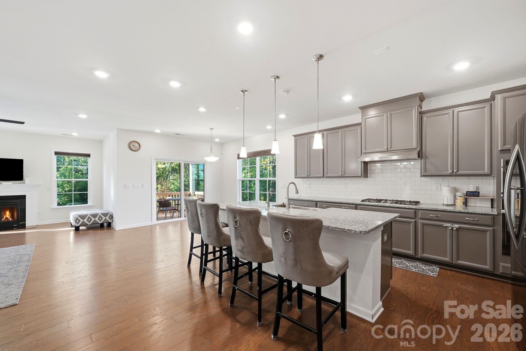 Beautiful kitchen with farm house sink, granite counter tops, SS appliances and open floor plan - 4603 Monument Valley Drive, Indian Land
