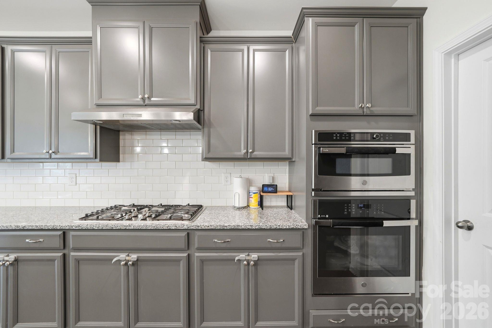Gas stove top and plenty of storage and counterspace to prepare meals and serve - 4603 Monument Valley Drive, Indian Land