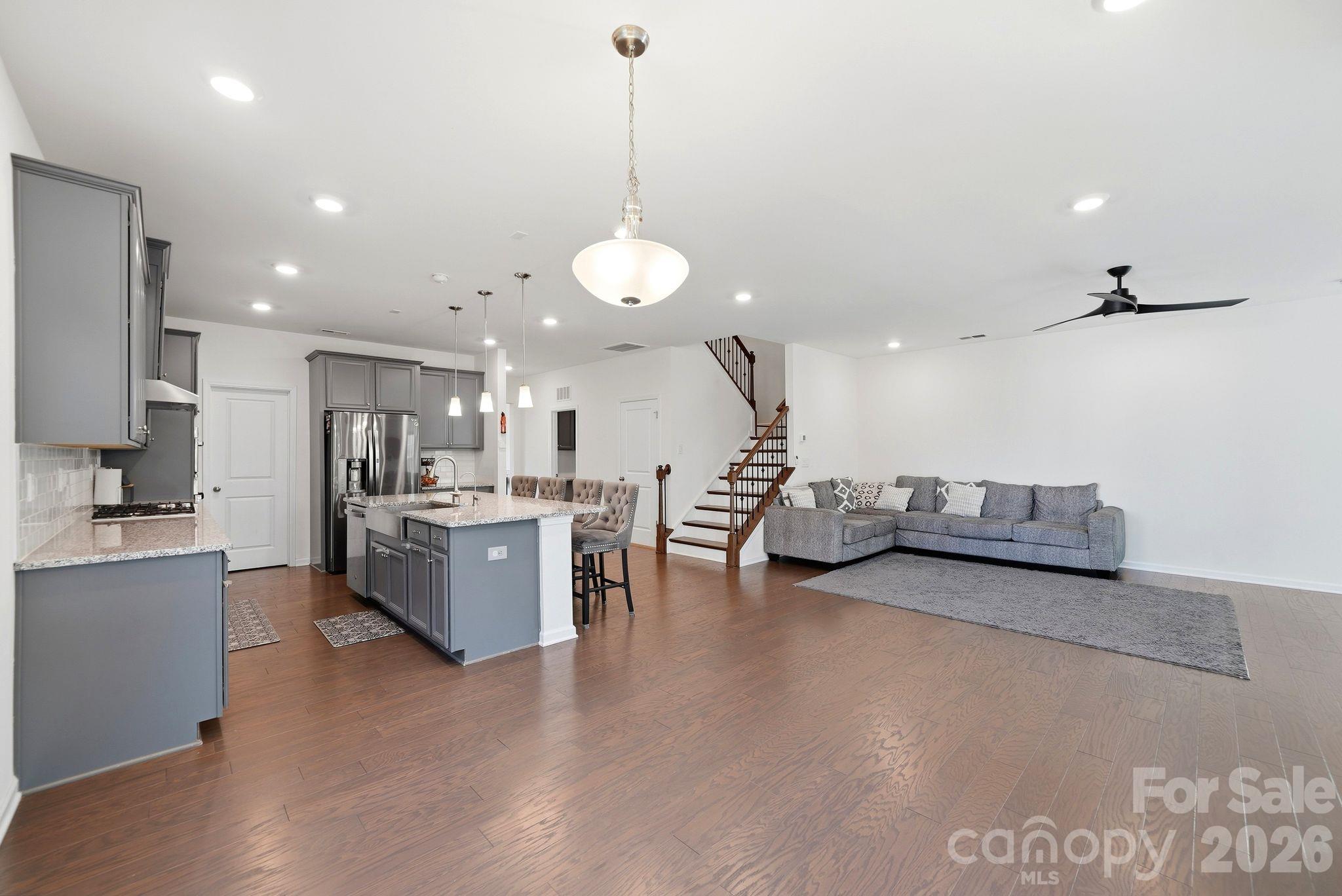 Beautiful kitchen with farm house sink, granite counter tops, SS appliances and open floor plan - 4603 Monument Valley Drive, Indian Land