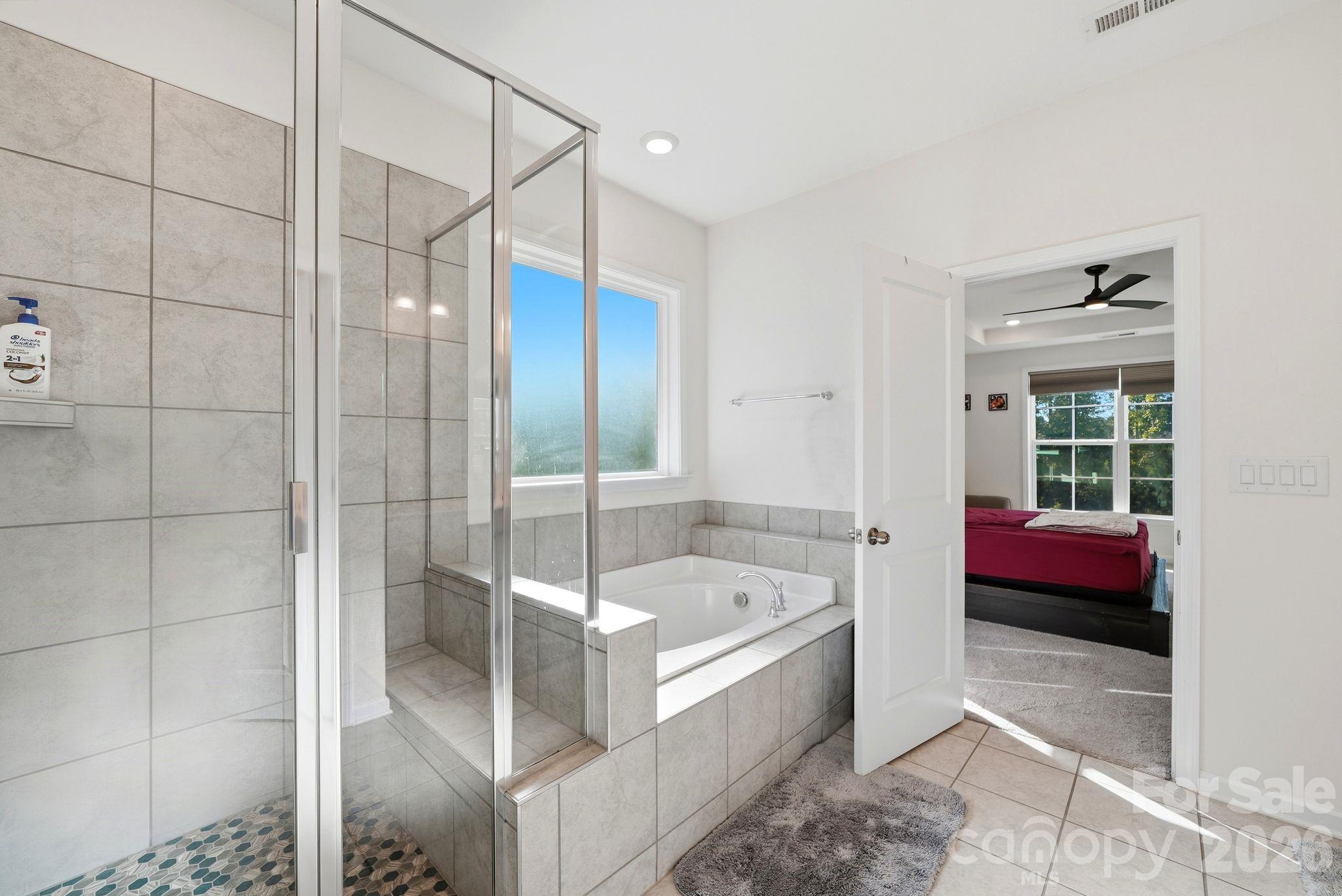 Main Level Primary Bath - Extended shower and garden tub - 4603 Monument Valley Drive, Indian Land