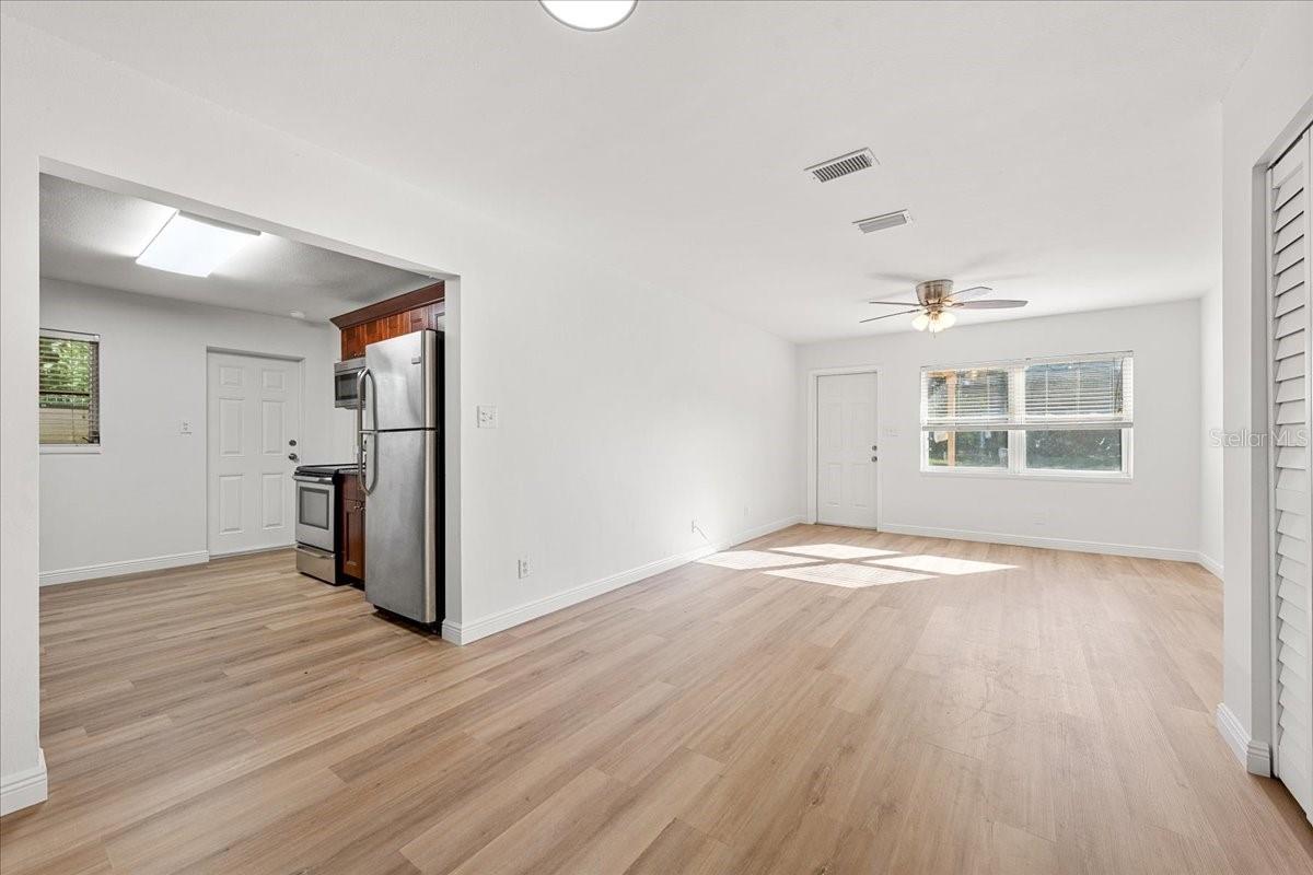 Dining area toward kitchen - 711 14TH ST, PALM HARBOR