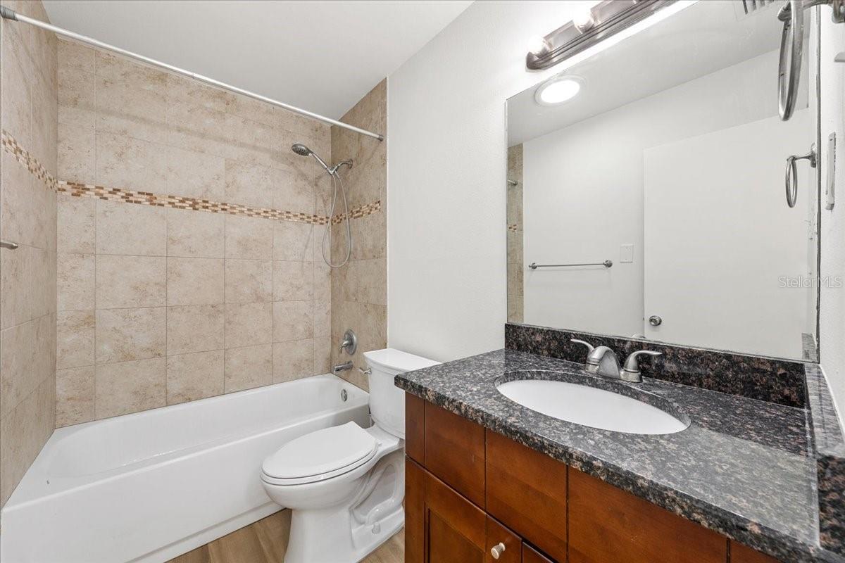 Bathroom with tub/shower - 711 14TH ST, PALM HARBOR