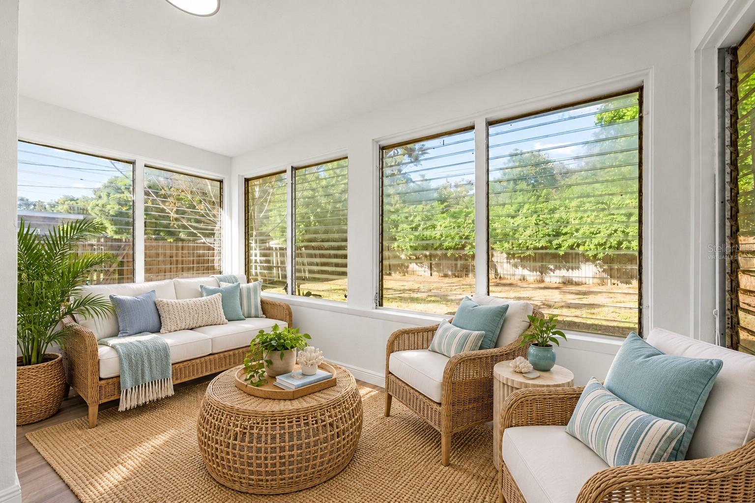 Virtually Staged sunroom - 711 14TH ST, PALM HARBOR