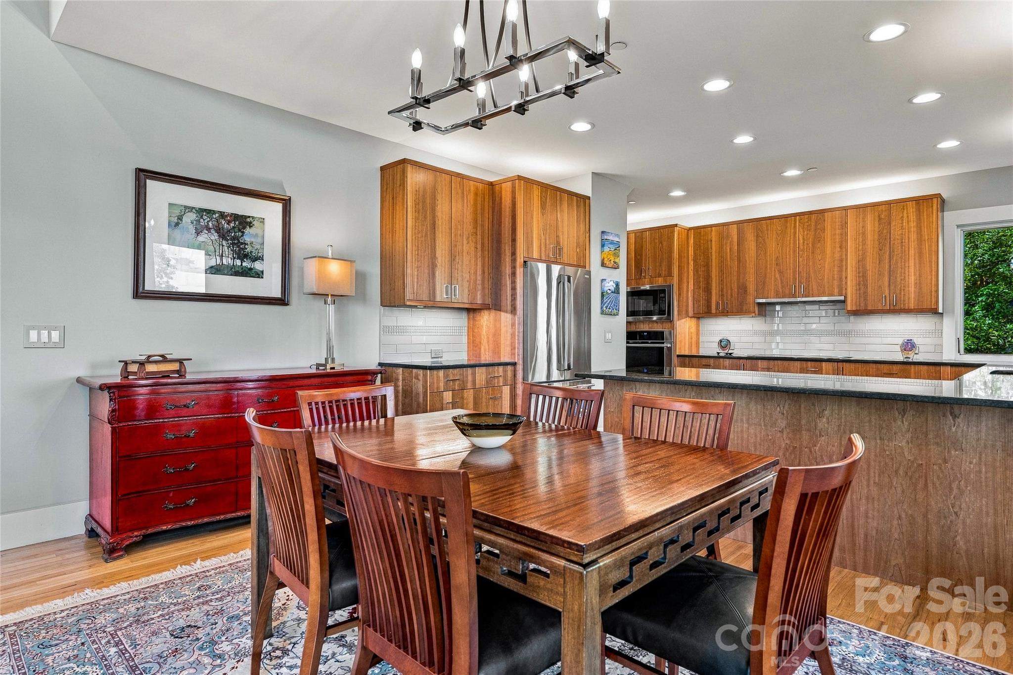 Elegant Dining Area with Custom Cabinetry - 22 Quartz Trail, Hendersonville