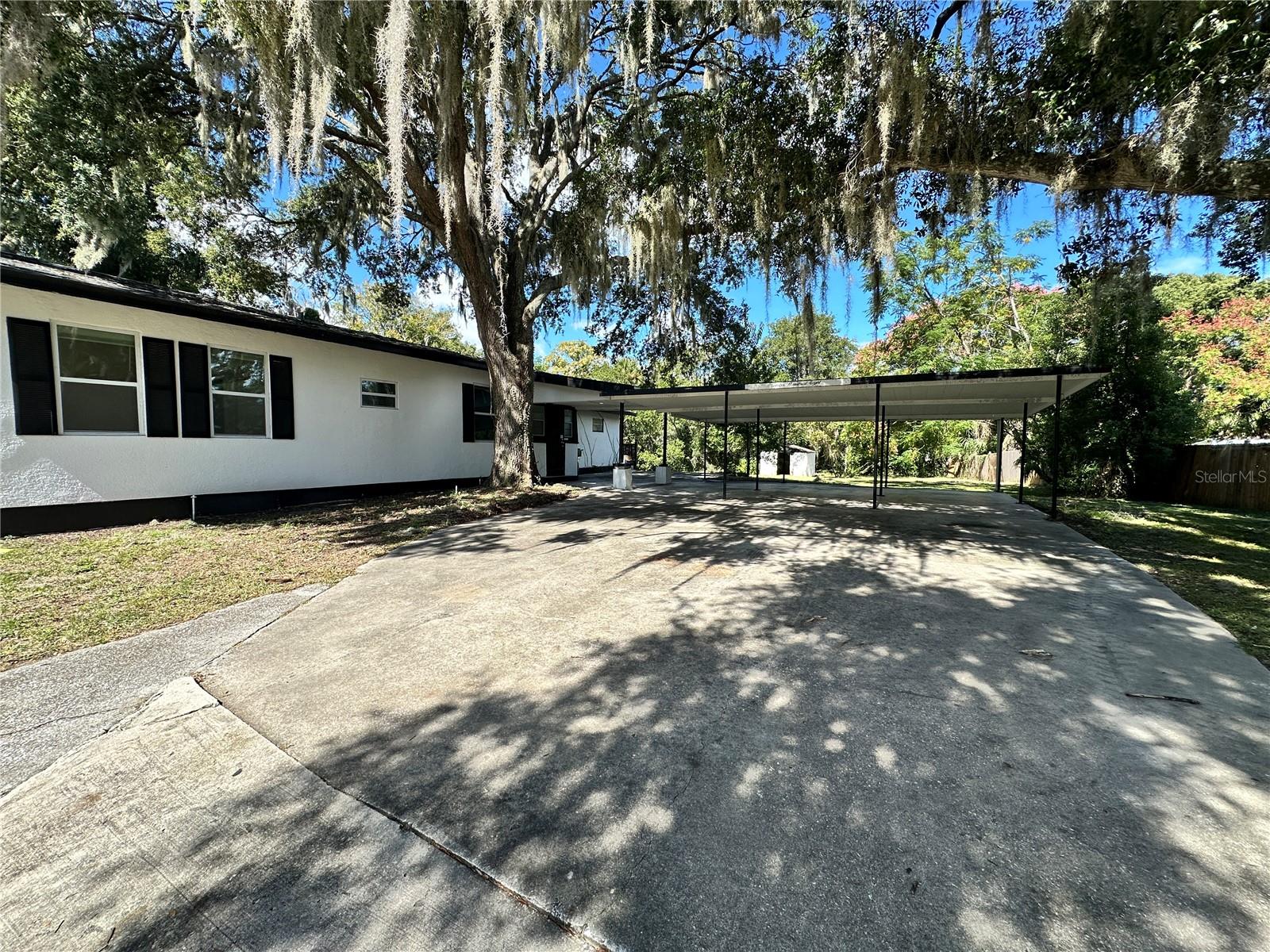 Side with Carport - 1208 BONAIRE DR, LEESBURG